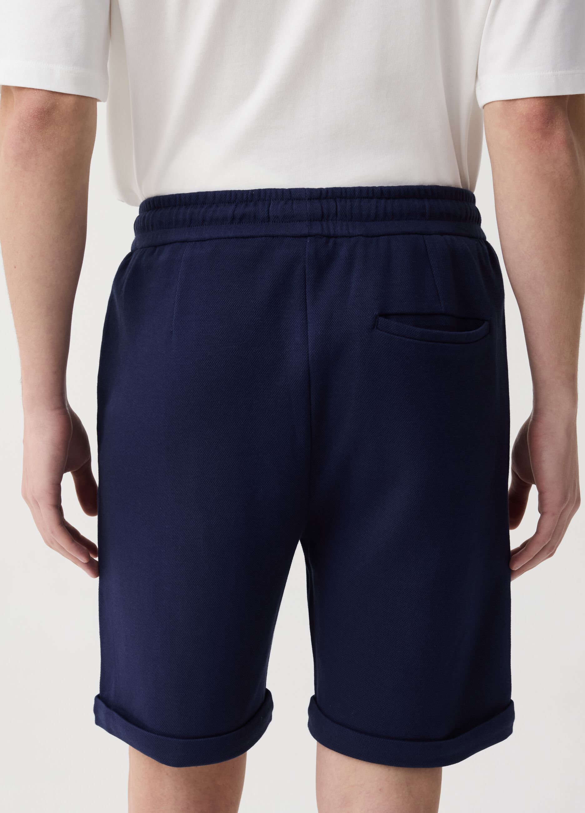 Bermuda joggers with darts and folds
