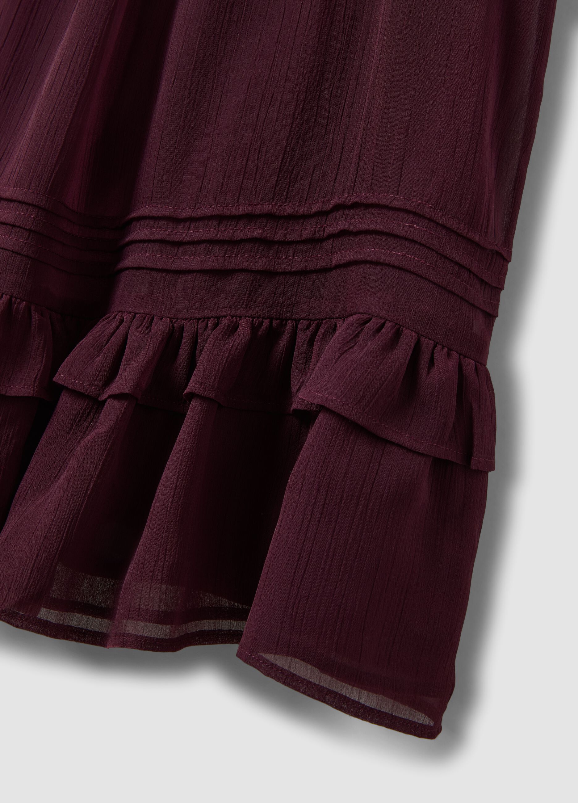 Purple mini dress with ruffles and plunging neckline