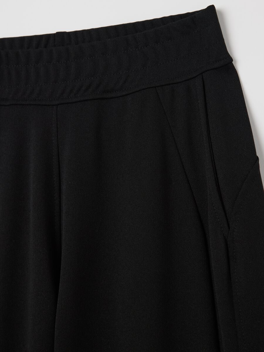 Black palazzo trousers with pockets_5