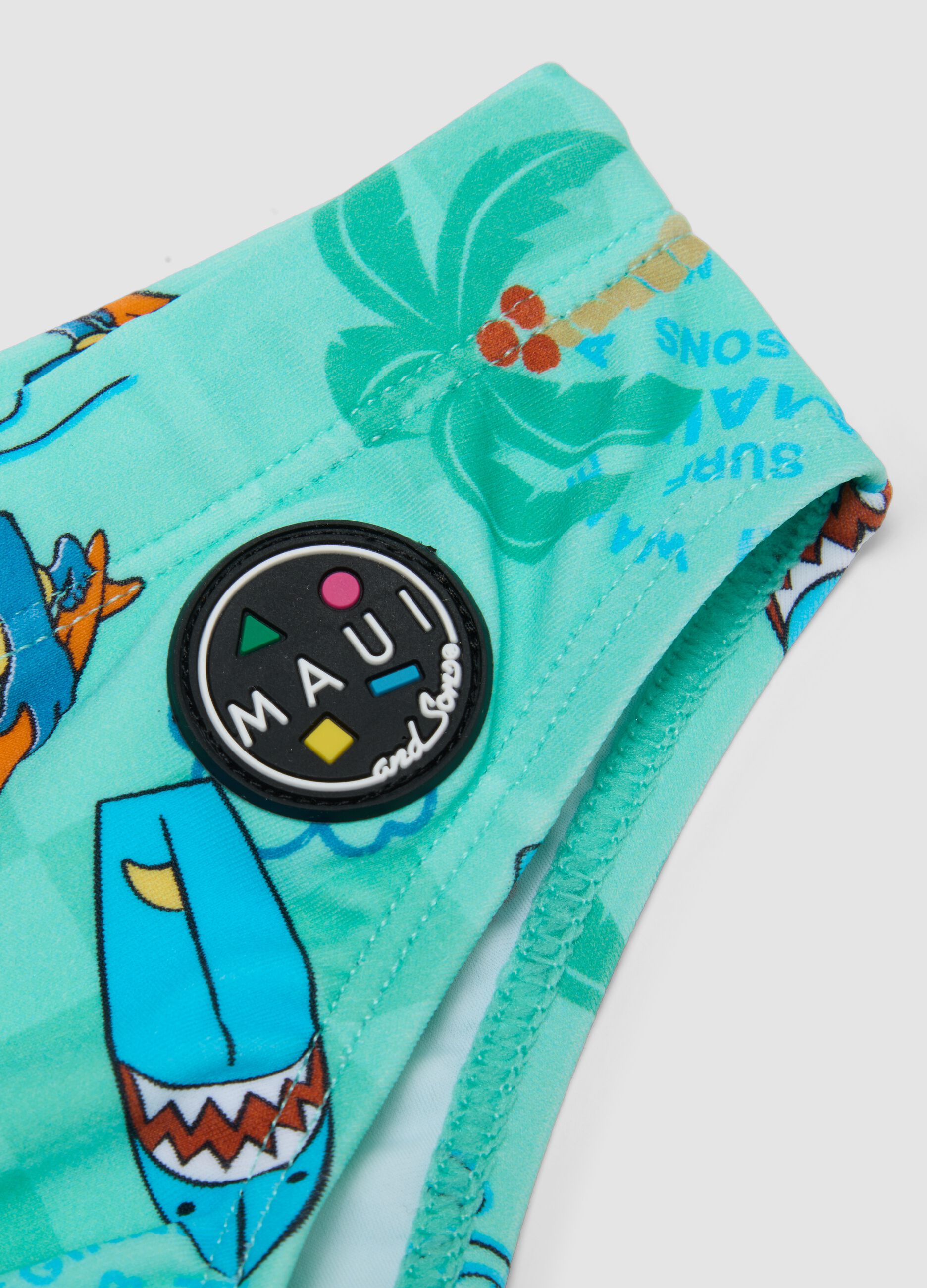 Boys&rsquo; blue stretch swim briefs with print