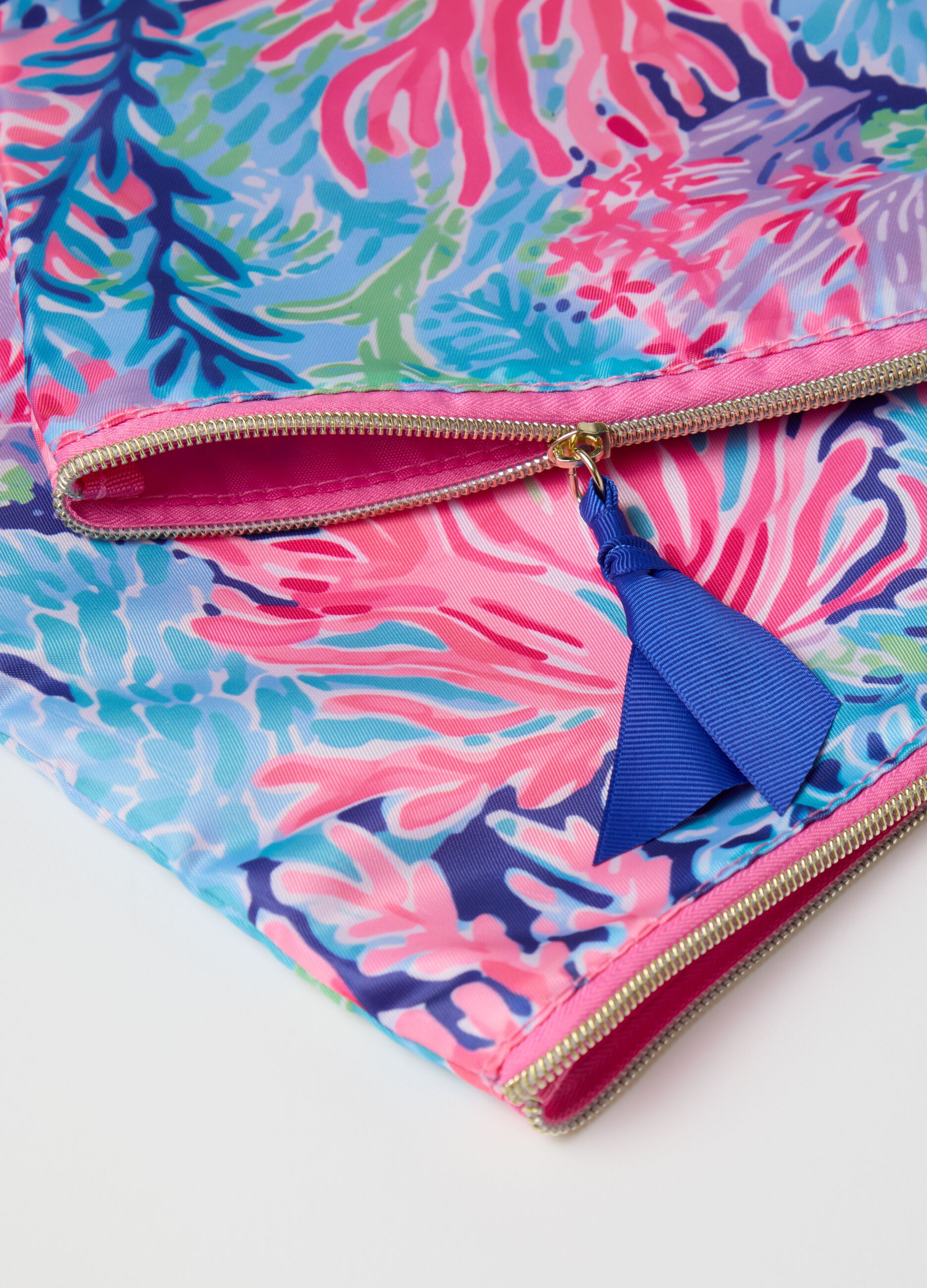 Women's clutch bag with print and blue bow