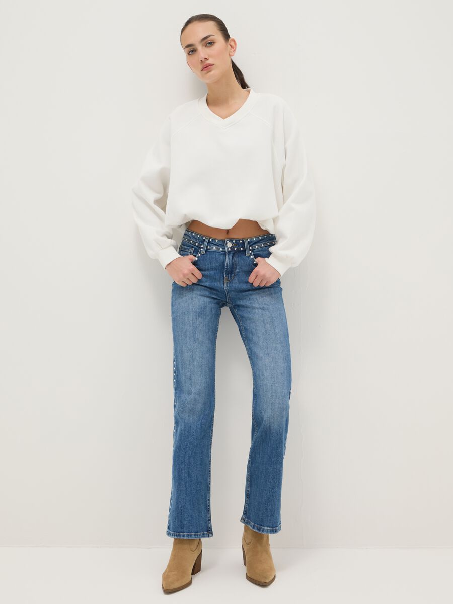 Blue denim bootcut jeans with studs_0