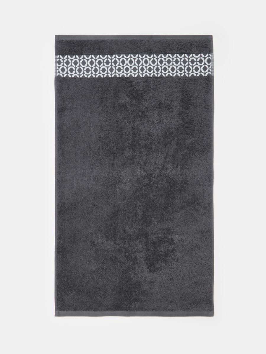 Face towel with dots patterned trim_0