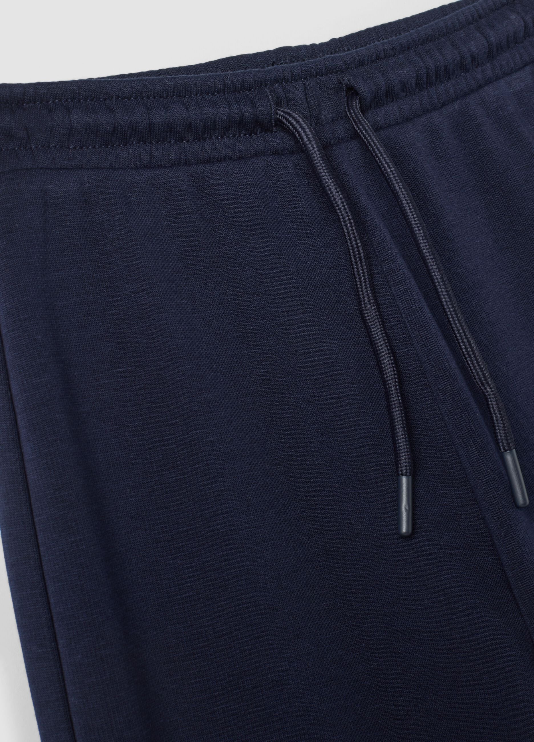 Pantaloni blu wide leg in tessuto fleece elasticizzato