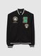 Black cotton blend bomber jacket with Celtics prints_0