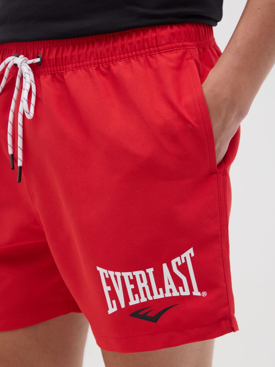Red swimming trunks with logo print_2