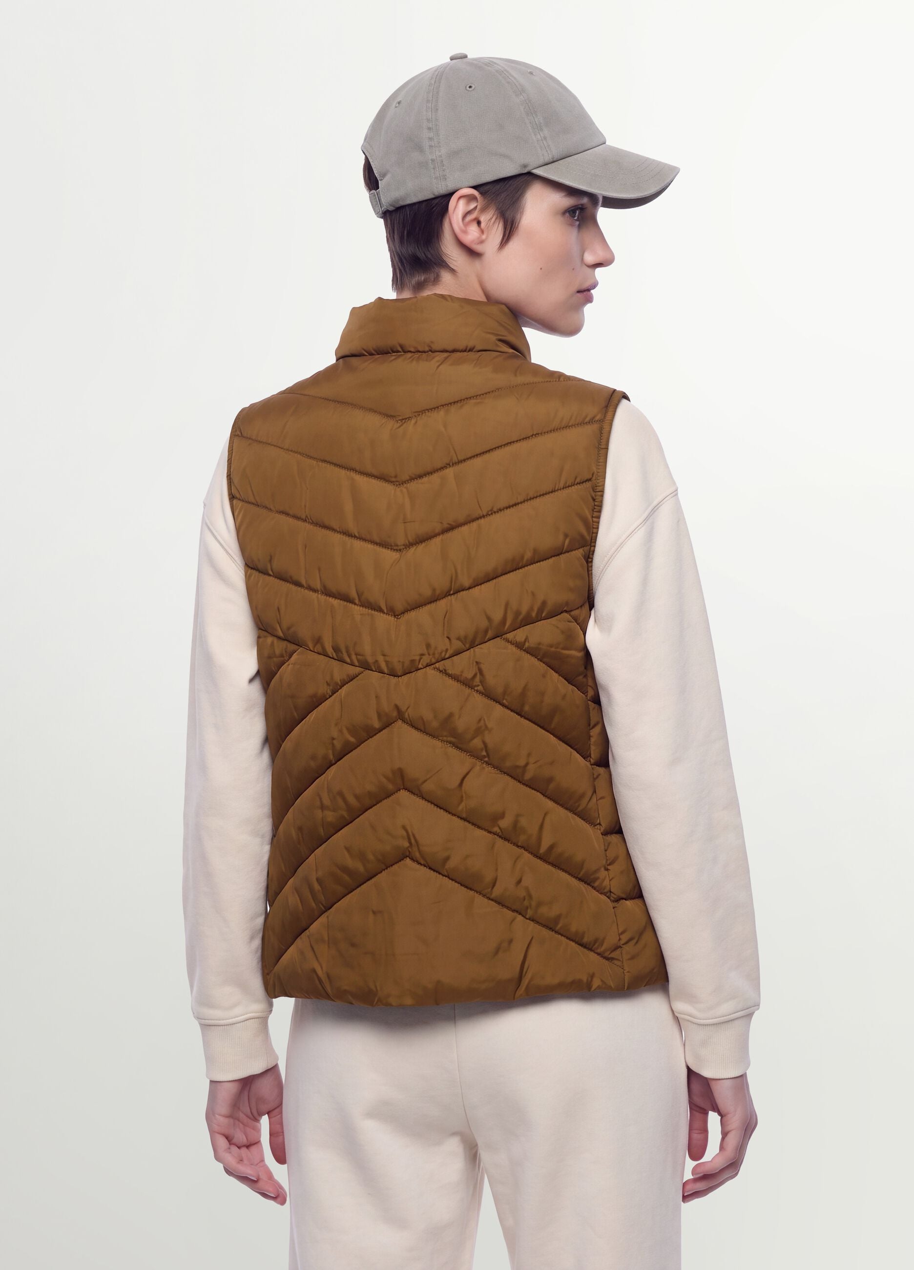 Yellow ultralight quilted gilet with zip and high neck