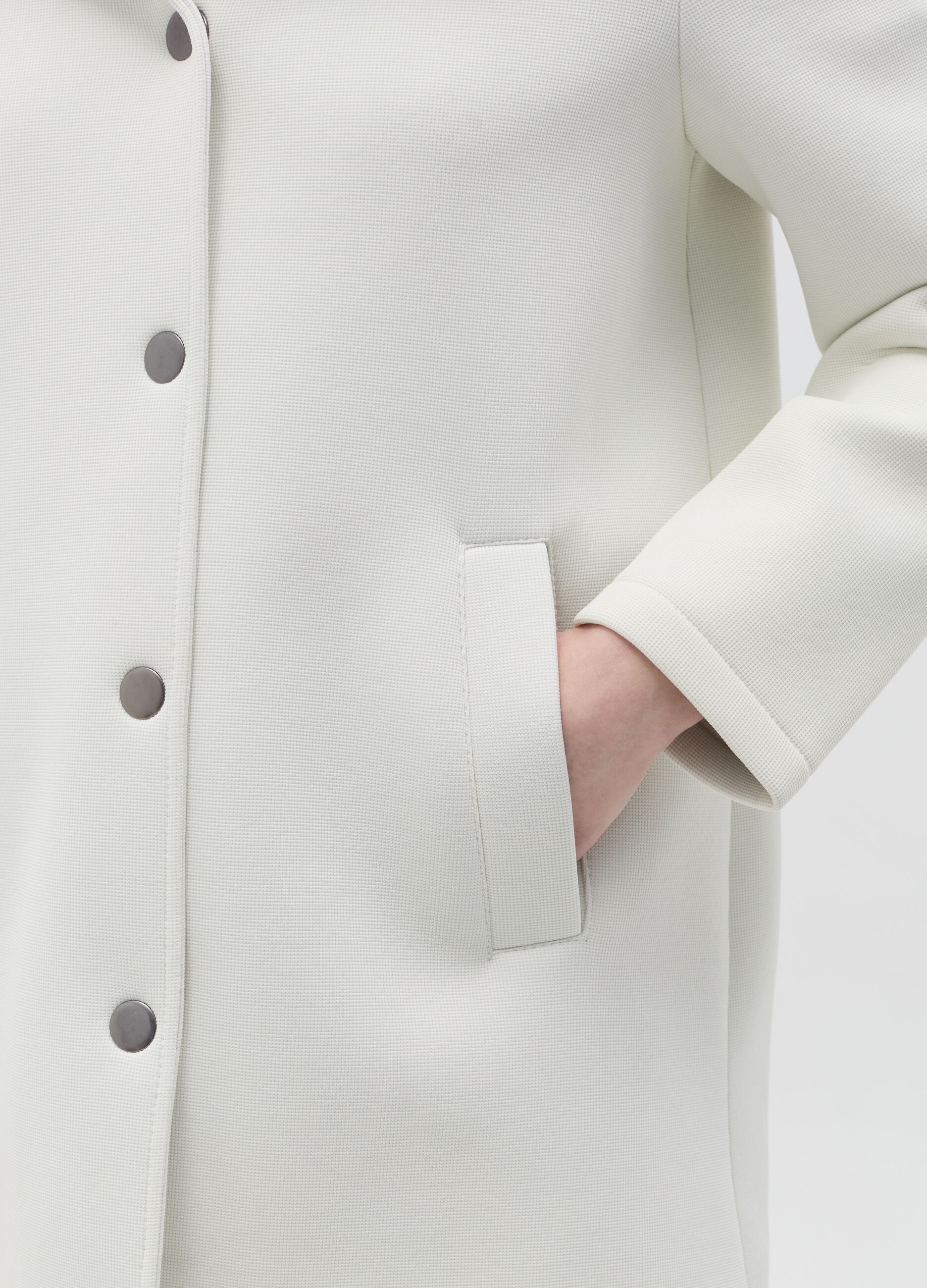 Hooded coat with buttons