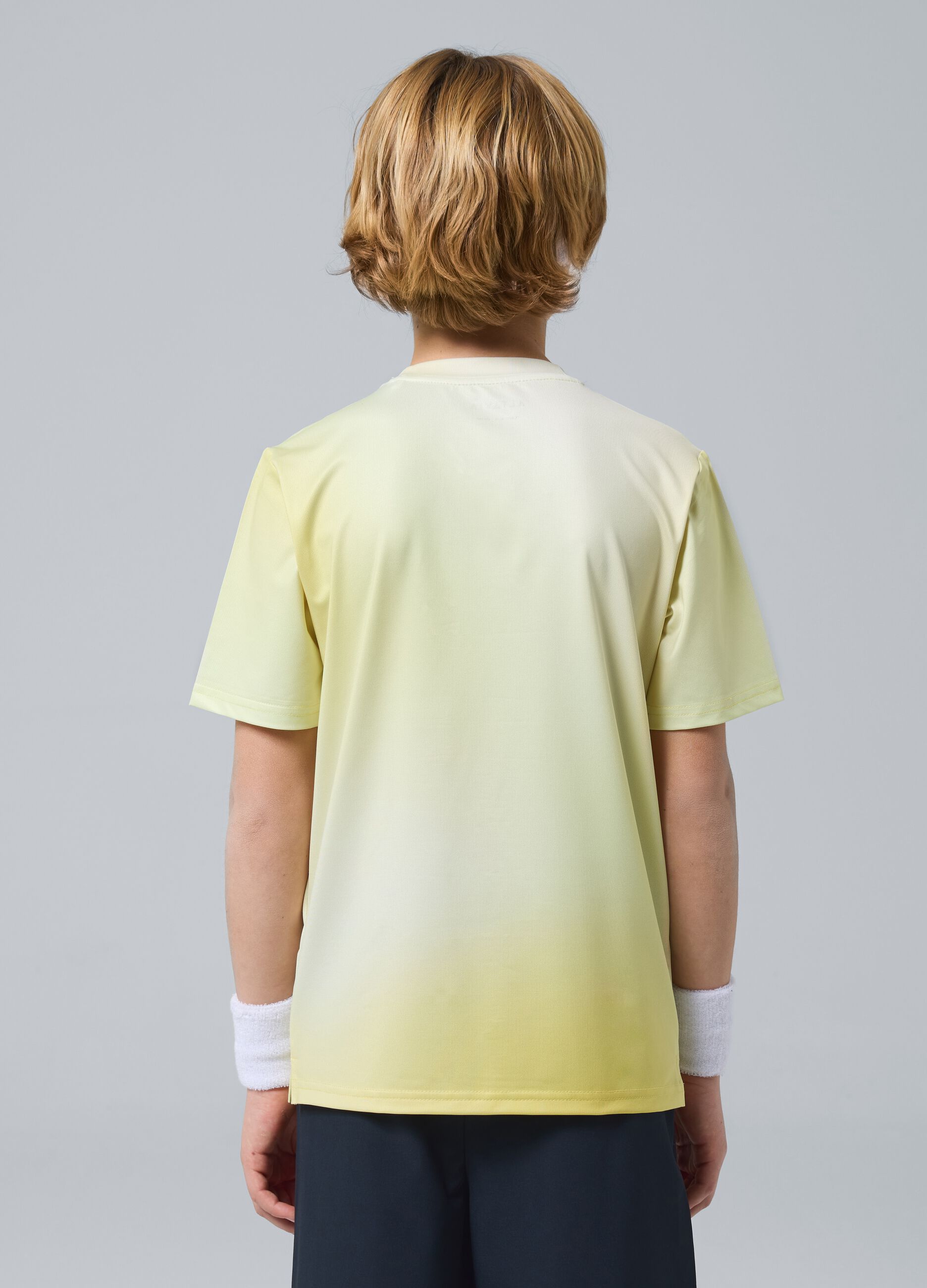 T-shirt sportiva gialla in tessuto tecnico elasticizzato con effetto tie-dye per bambino ALTAVIA COURT