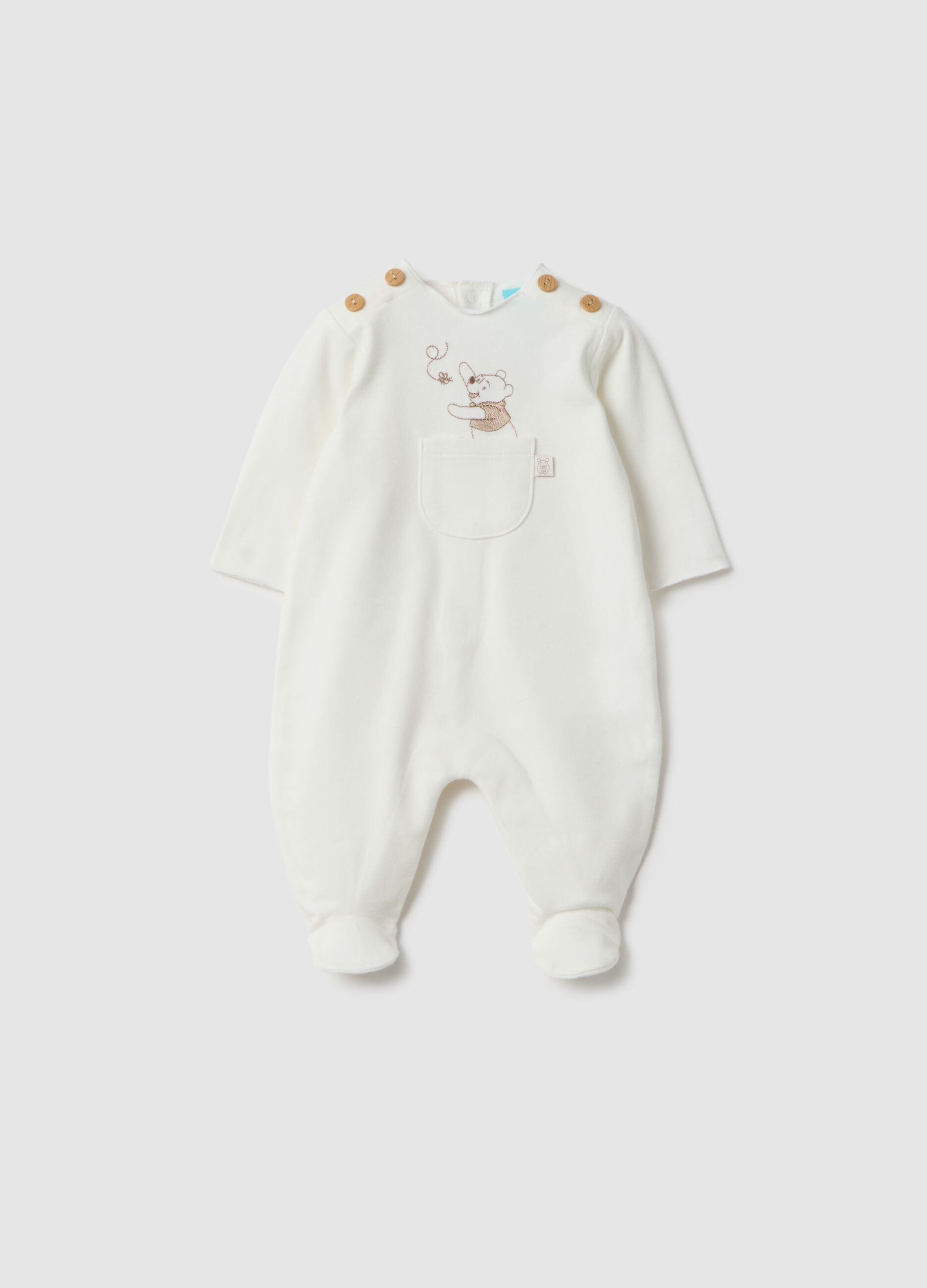 White newborn stretch cotton sleepsuit with integrated feet