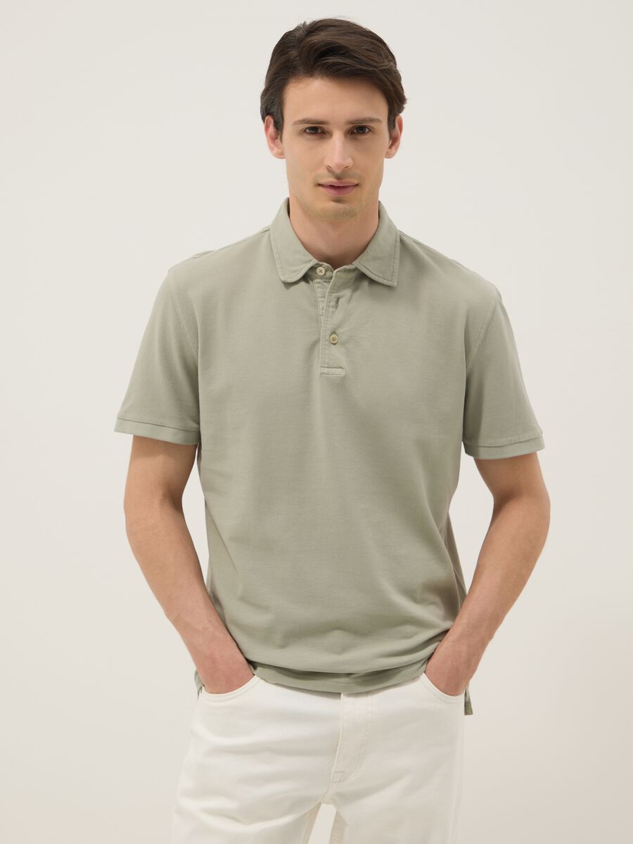 Polo verde in puro cotone a maniche corte slim fit_1