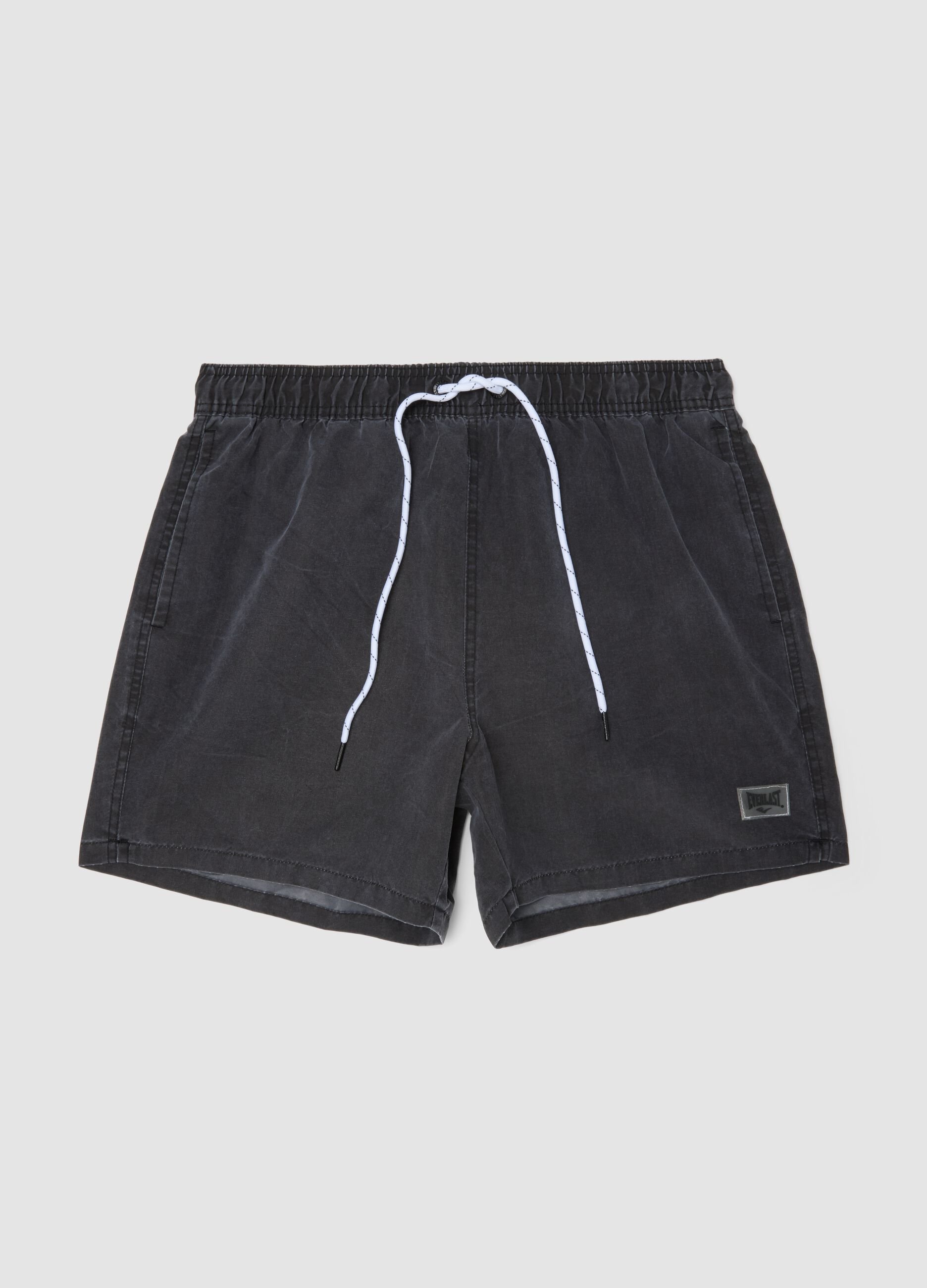 Black swim shorts with drawstring waist