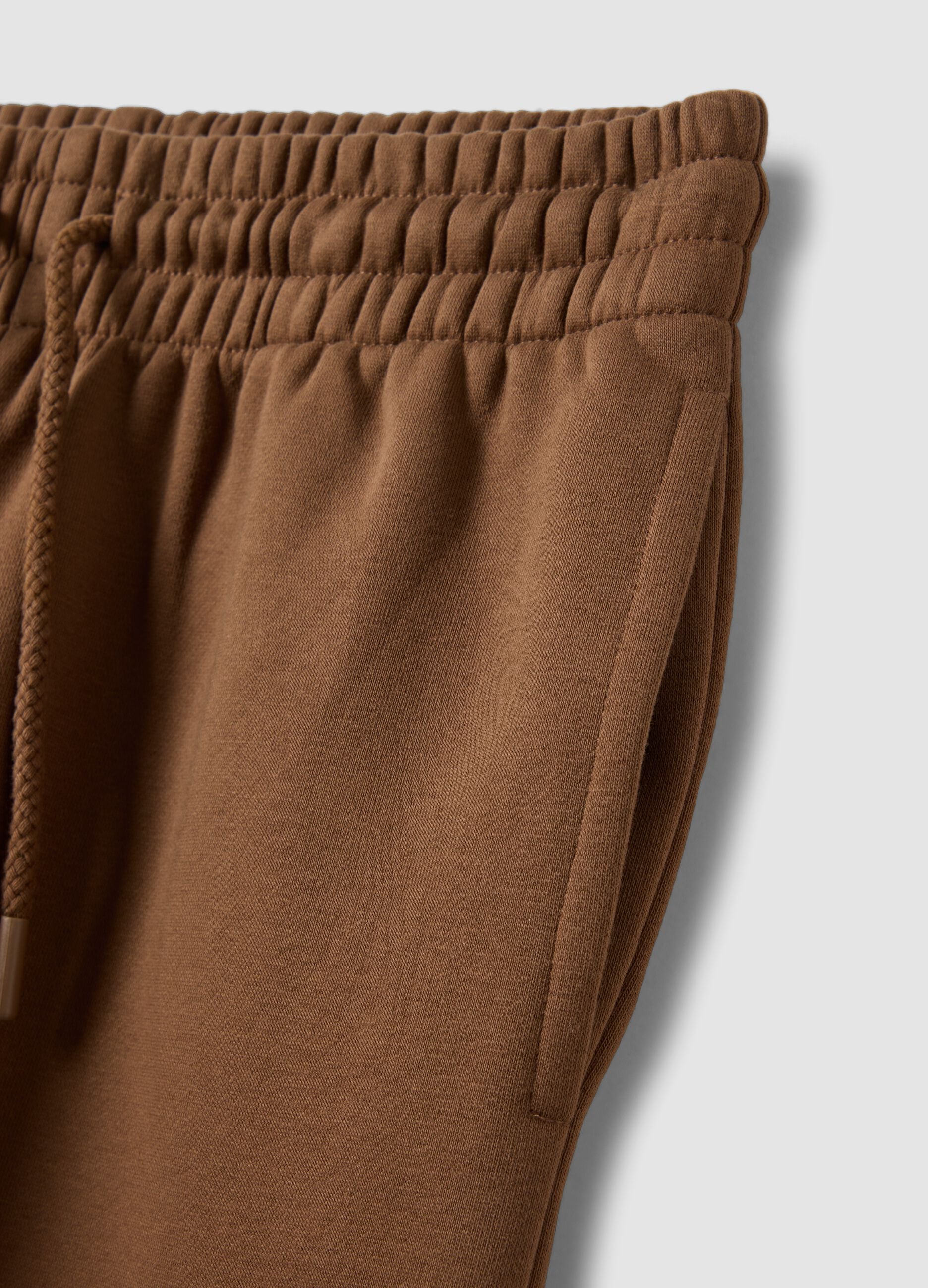 Brown cotton-blend jogger trousers with elasticated waist, regular fit