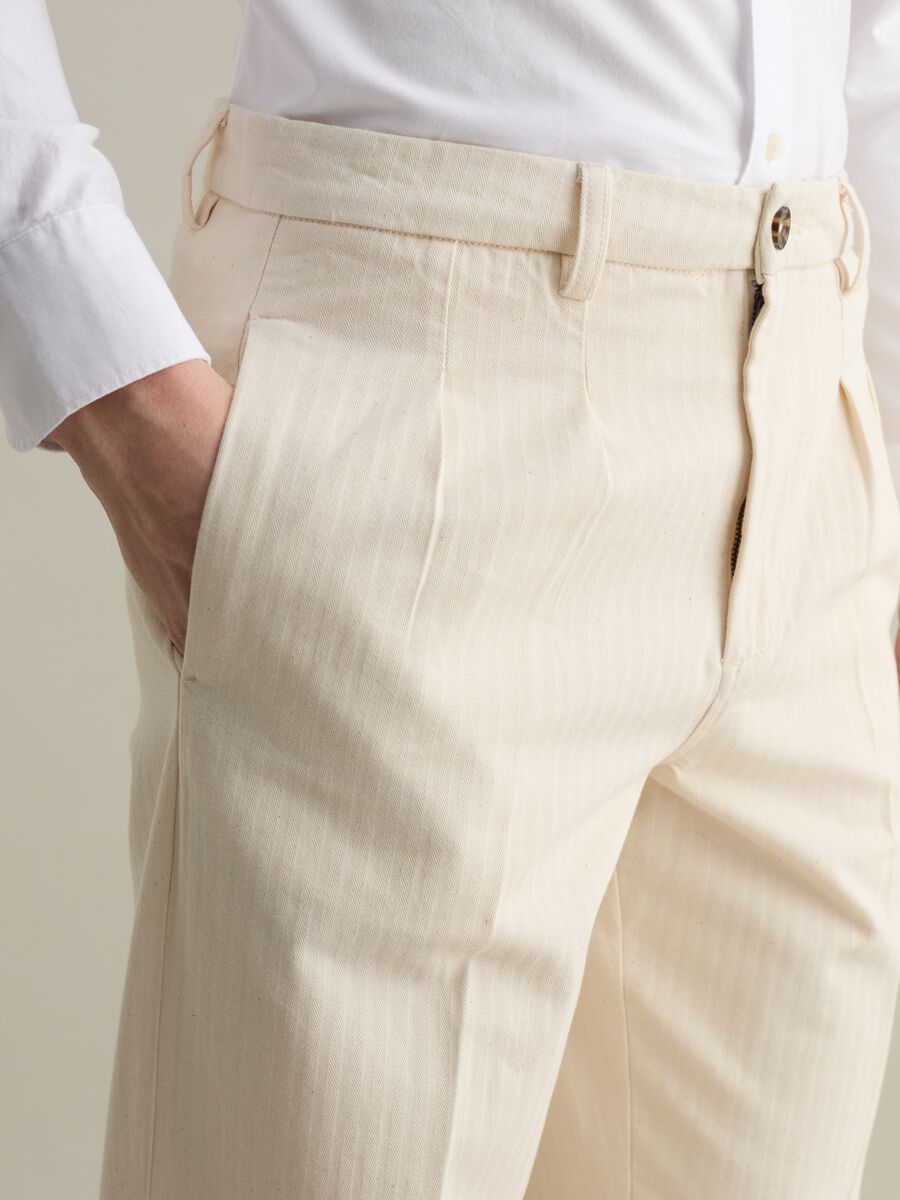 Pinstriped chino trousers with darts_3