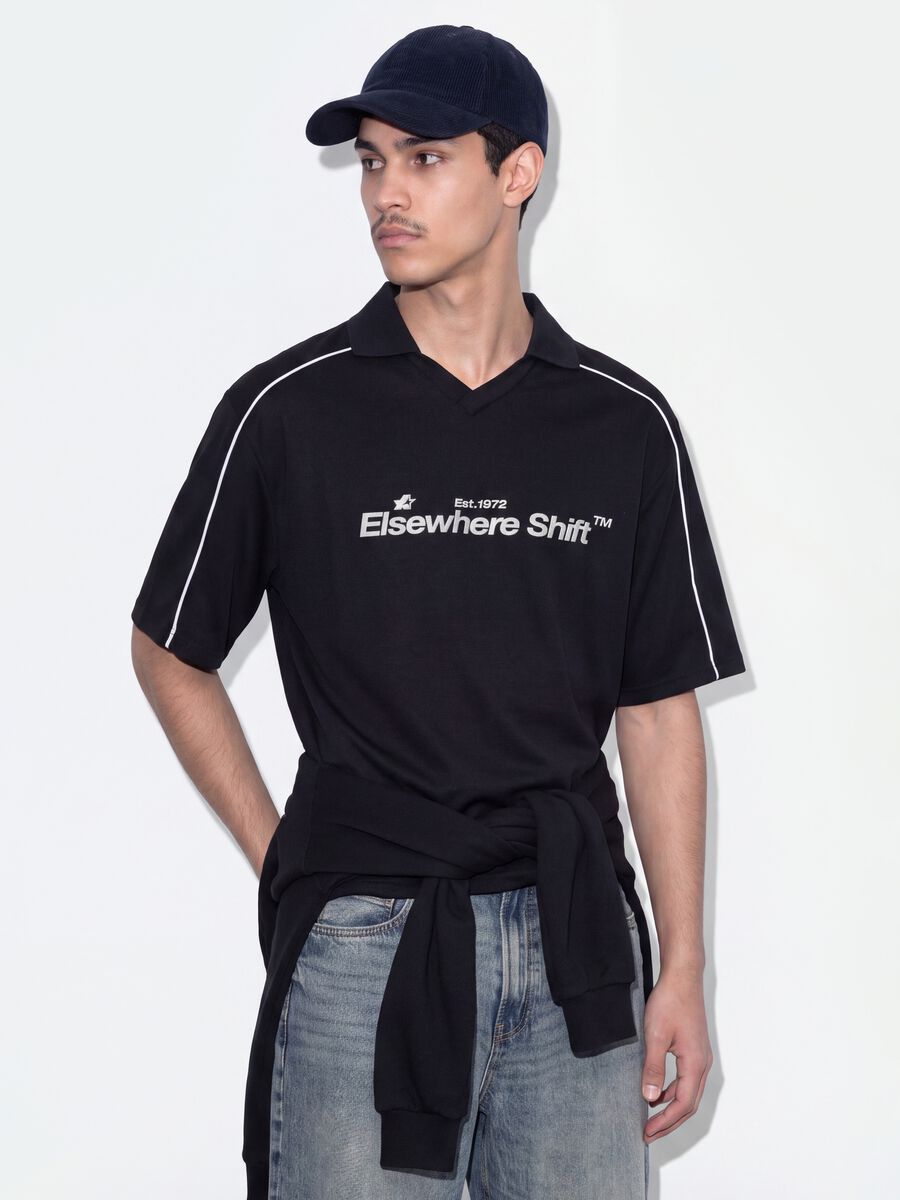 Polo nera in puro cotone over fit a maniche corte over fit_0