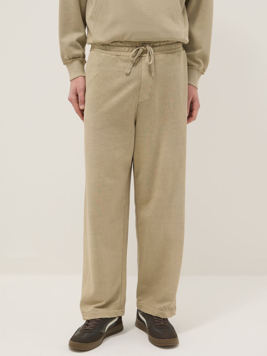 Oversize fit beige cotton blend trousers_1