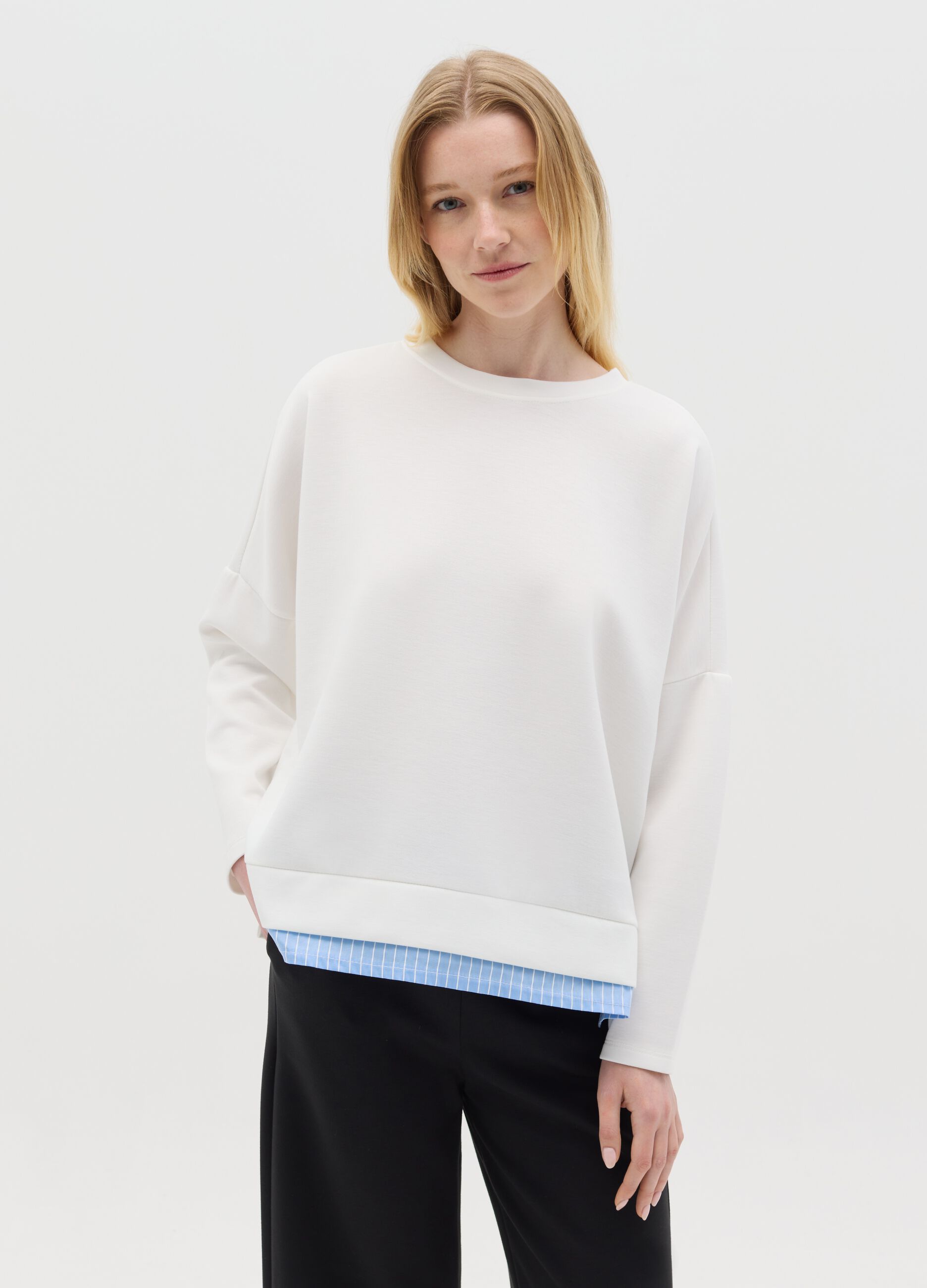 White top with layered-effect hem