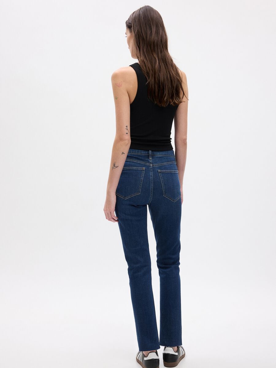 Slim-fit high-waist jeans with raw edging_1