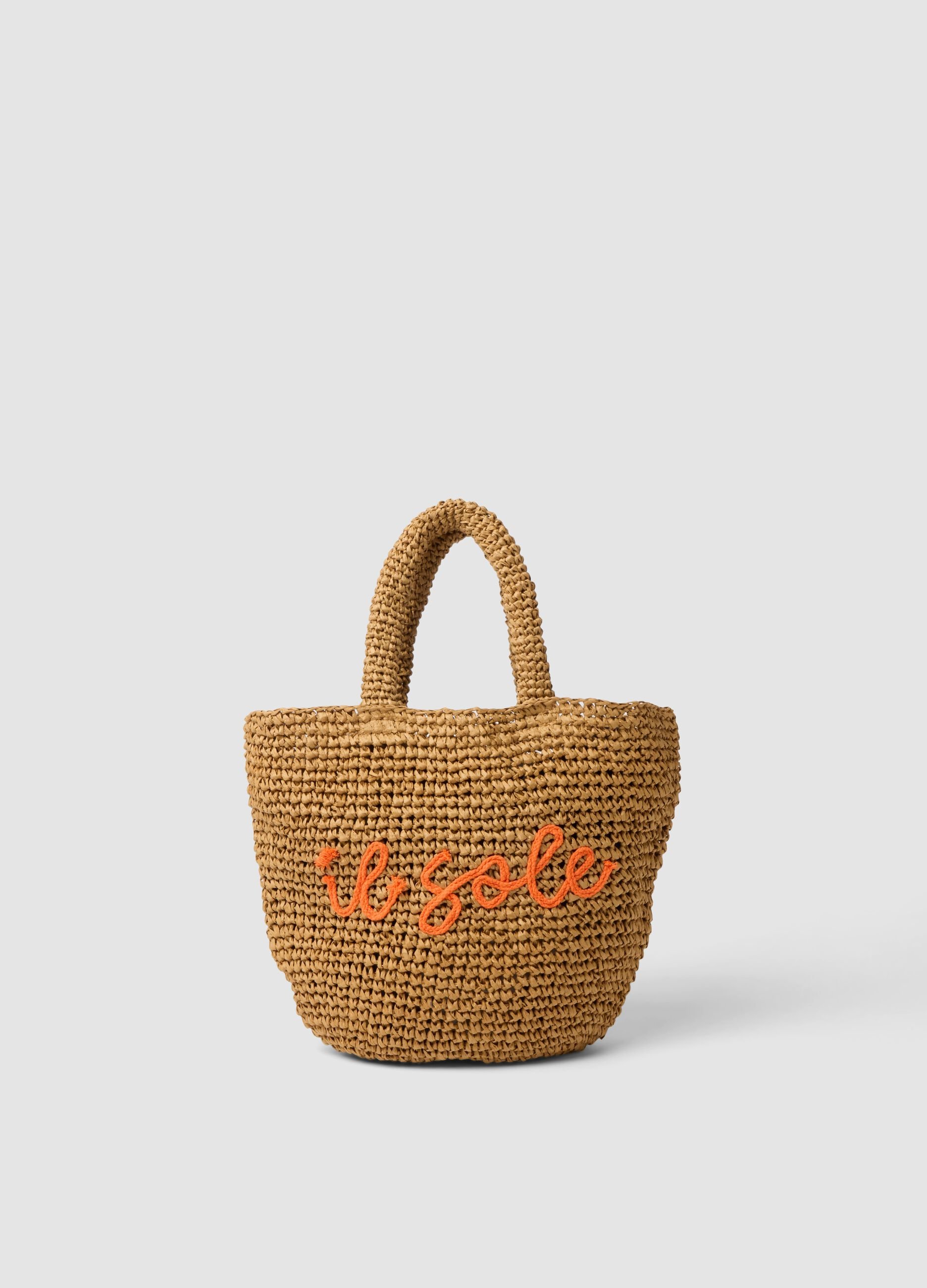 Brown beach bag in paper fabric