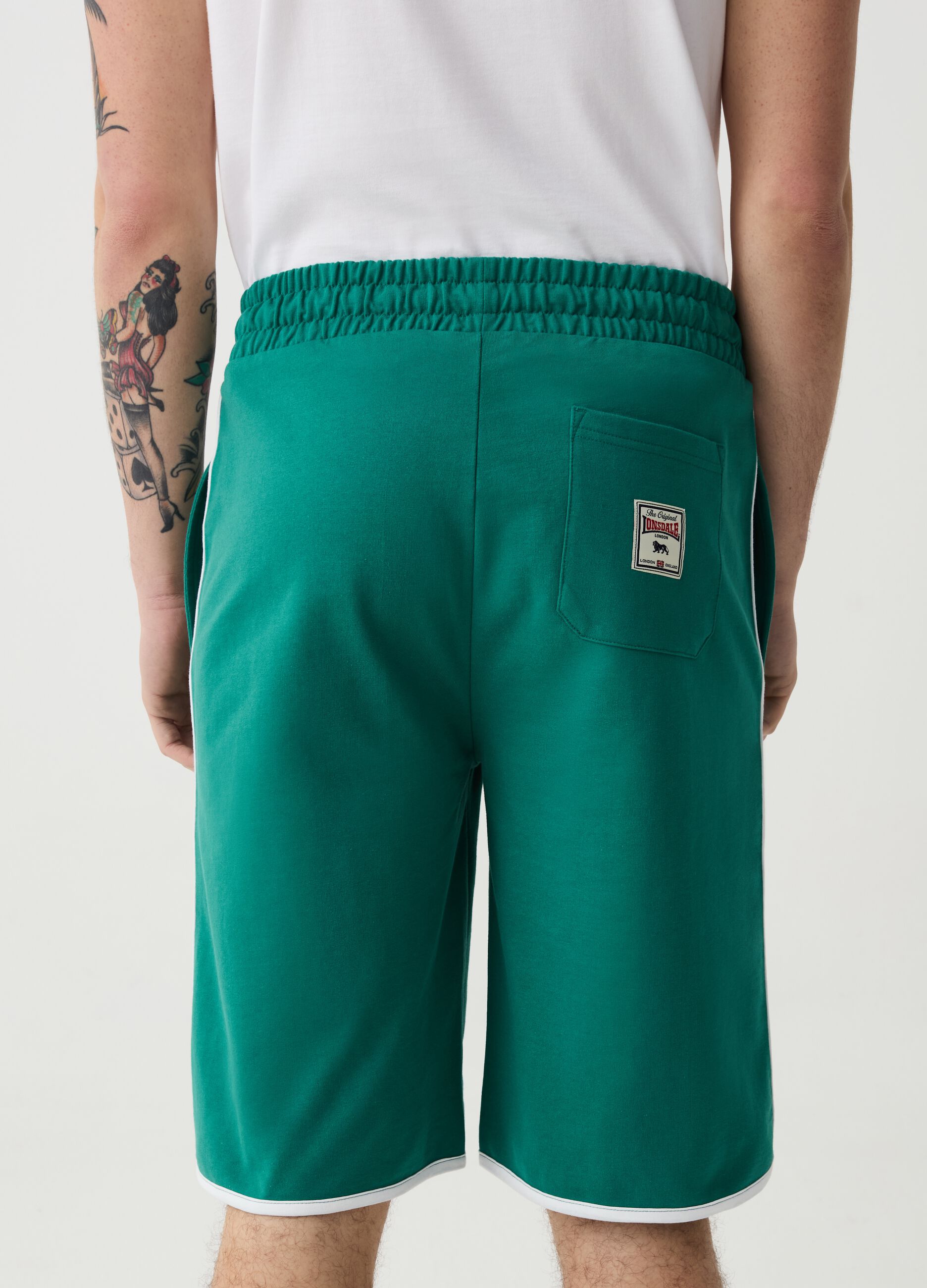 Bermuda joggers with logo print and contrasting edging