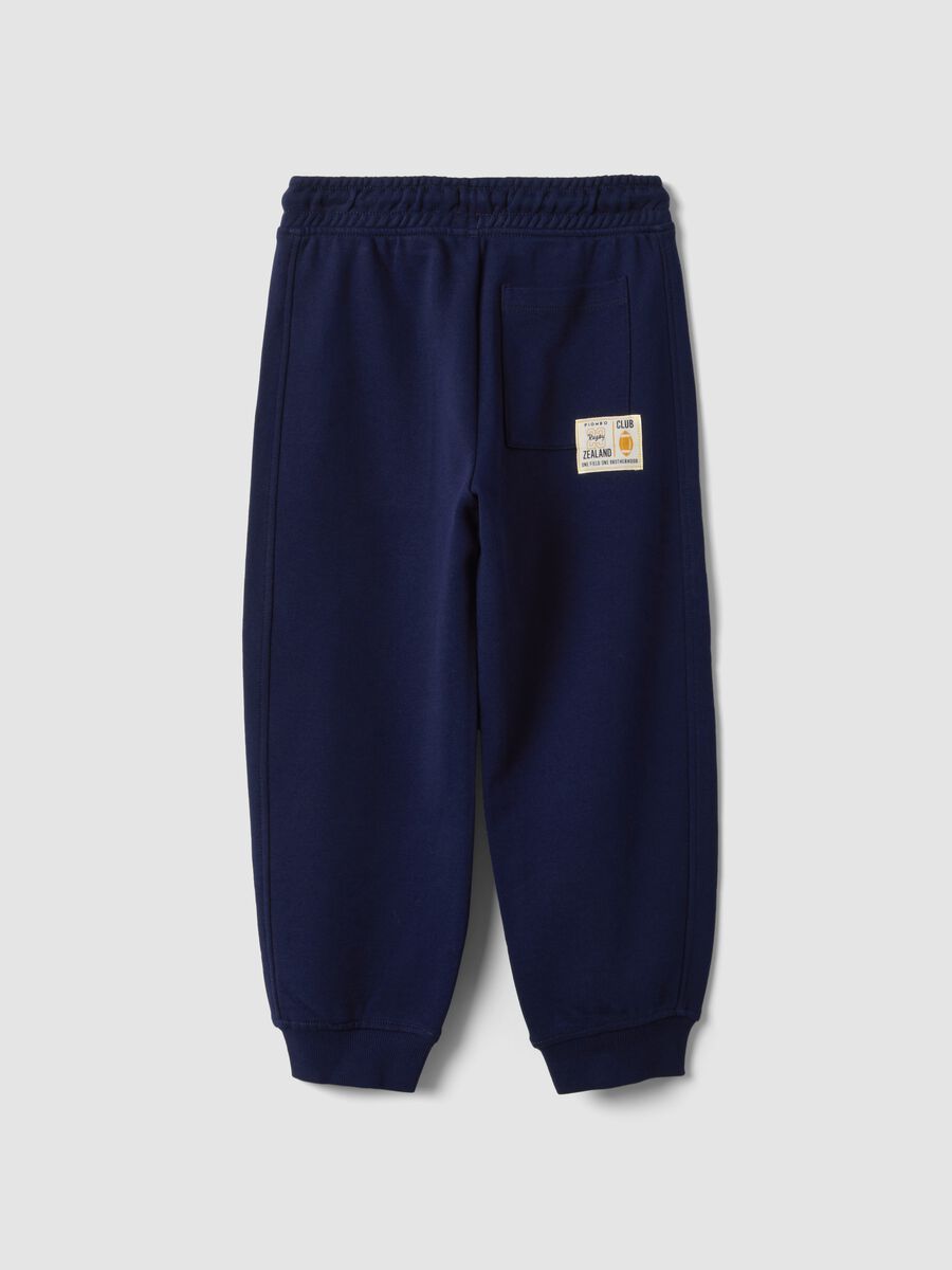 Pantaloni jogger blu in puro cotone con vita elasticizzata per bambino_1