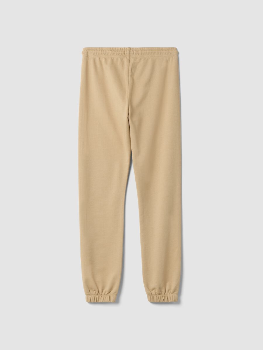 Pantaloni jogger beige in puro cotone_1