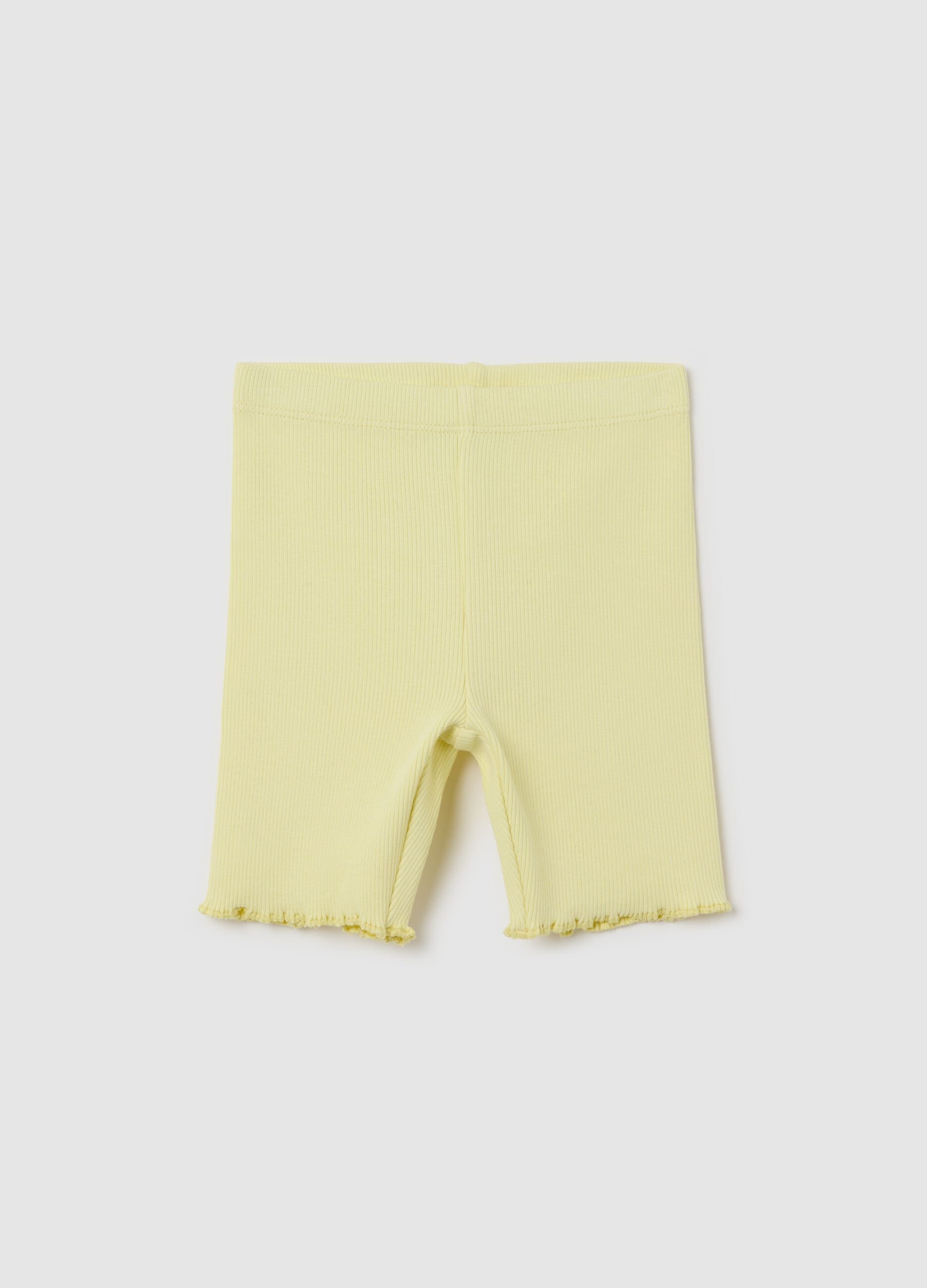 Ribbed yellow shorts with wavy hem