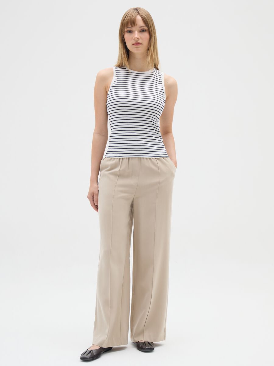 Pantaloni The Iconic Pants beige a gamba larga_0