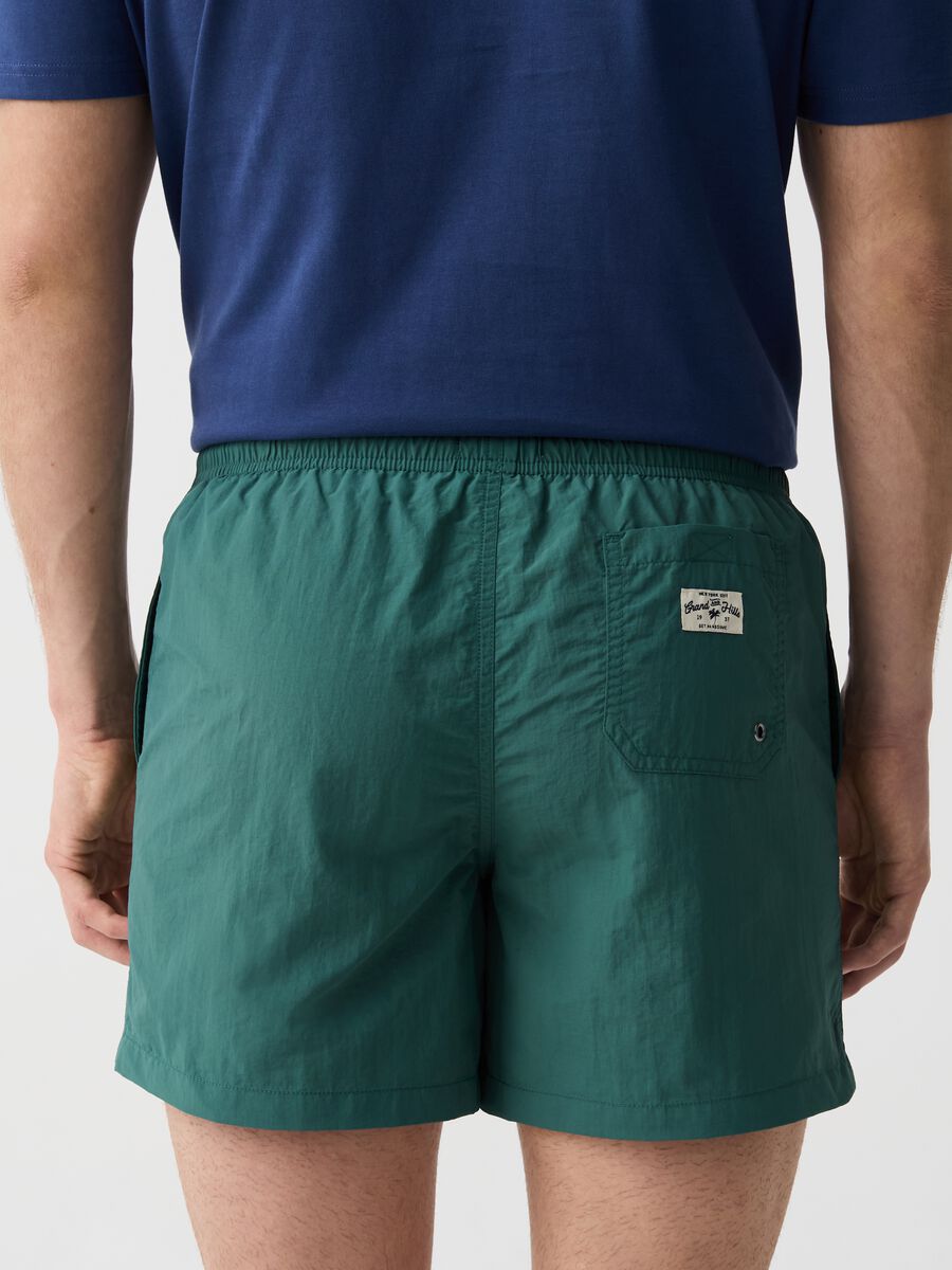 Swimming trunks with solid colour drawstring_2