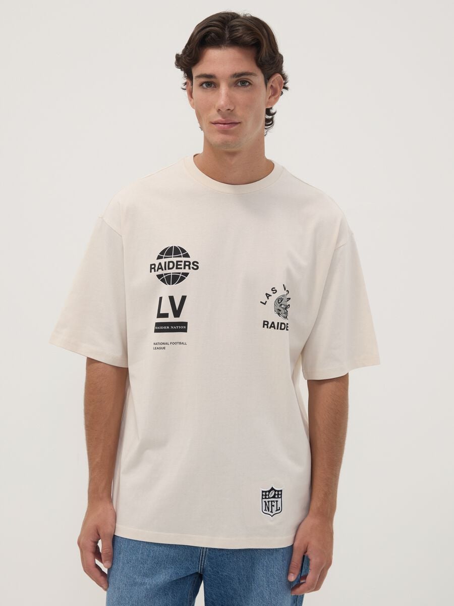 T-shirt beige in puro cotone con stampa Raiders_0