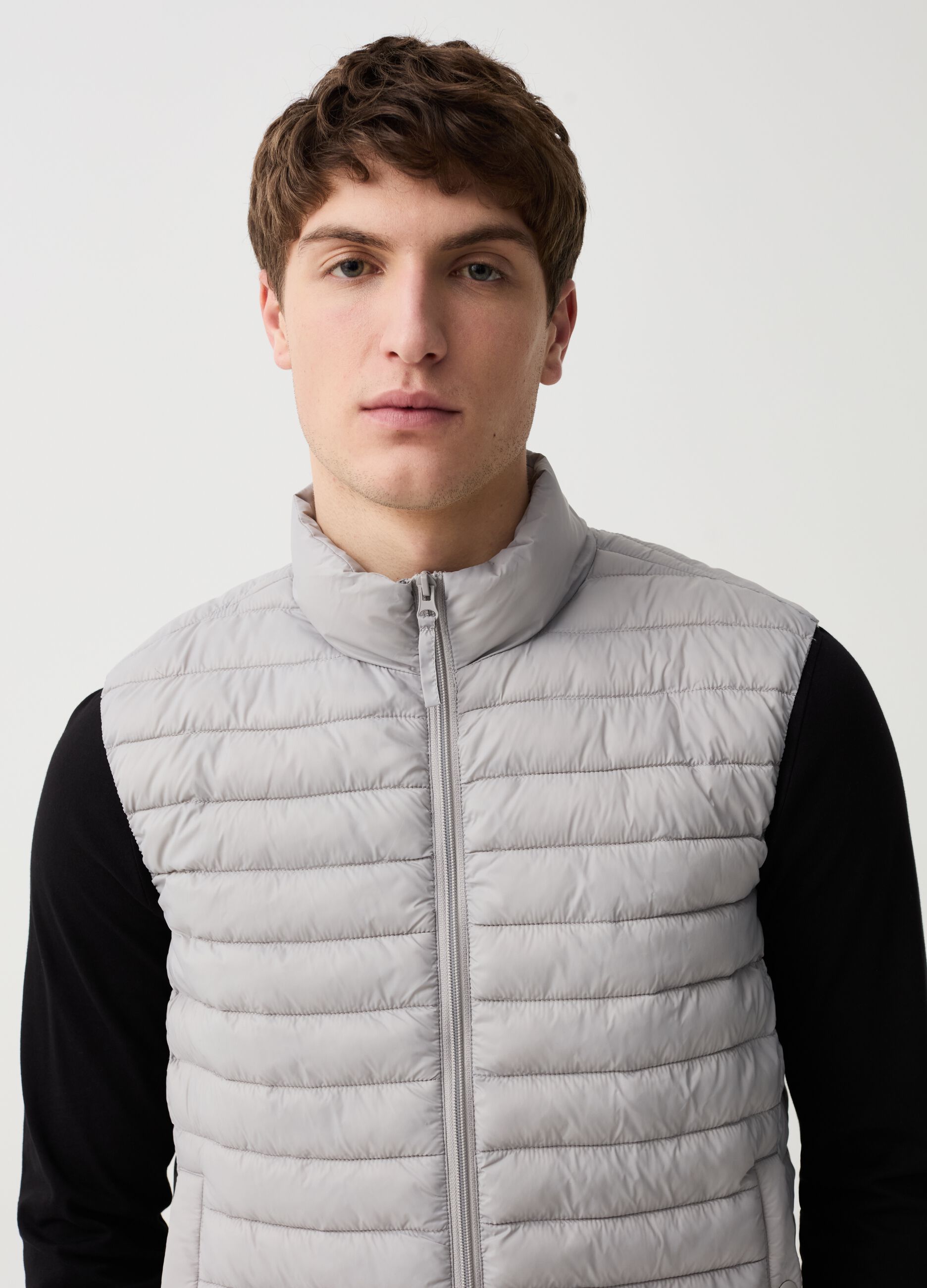 Ultralight quilted gilet with high neck