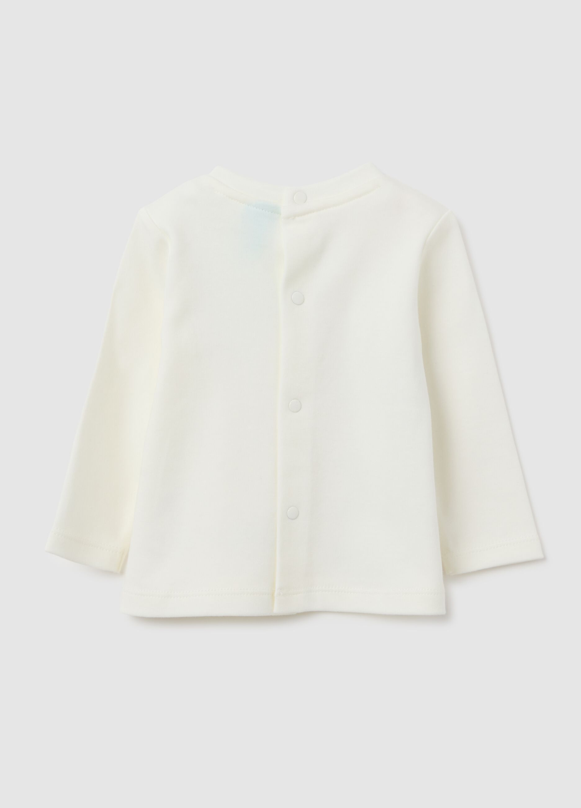 Newborn long-sleeve top in pure white cotton
