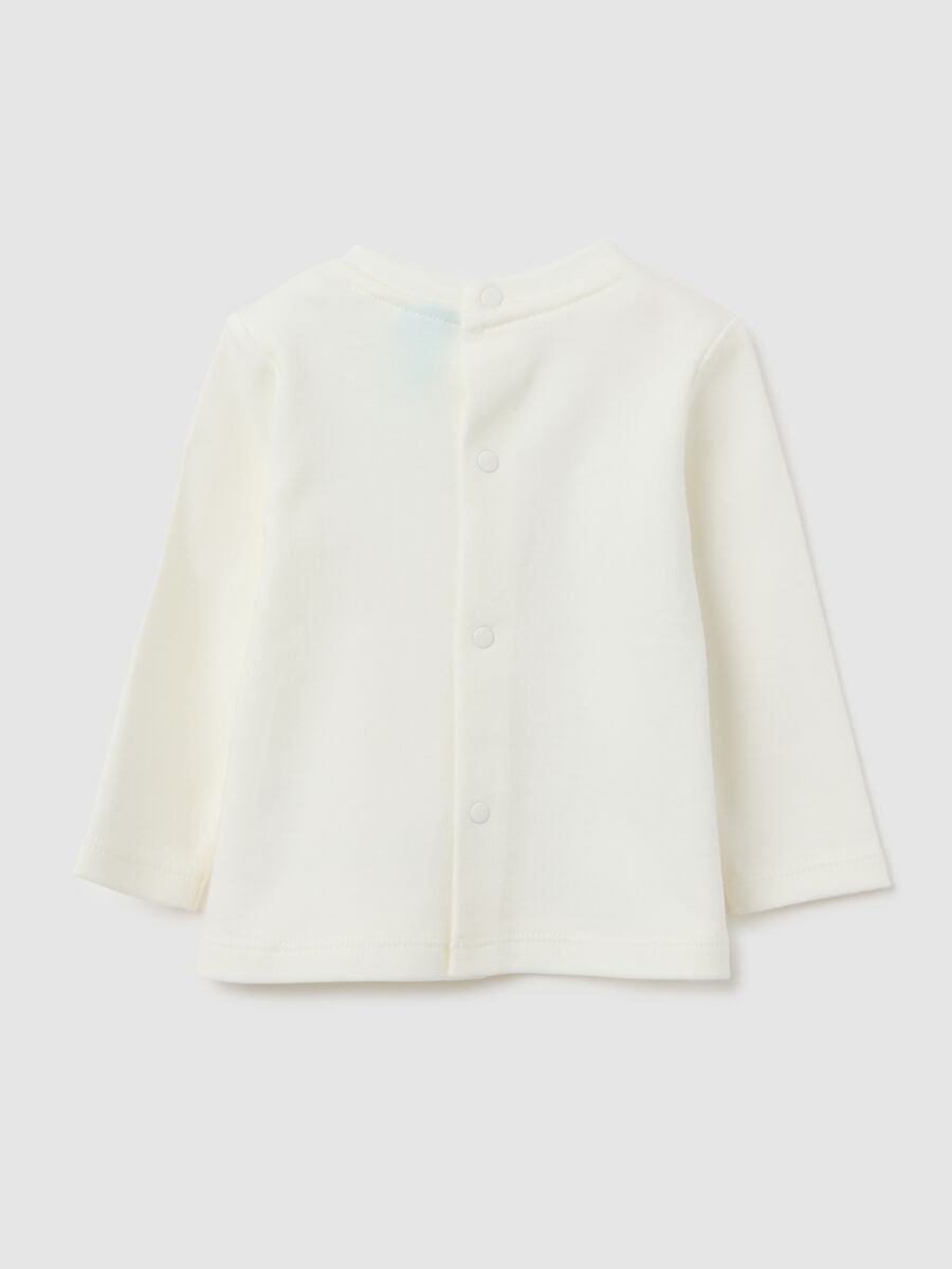 Newborn long-sleeve top in pure white cotton_1
