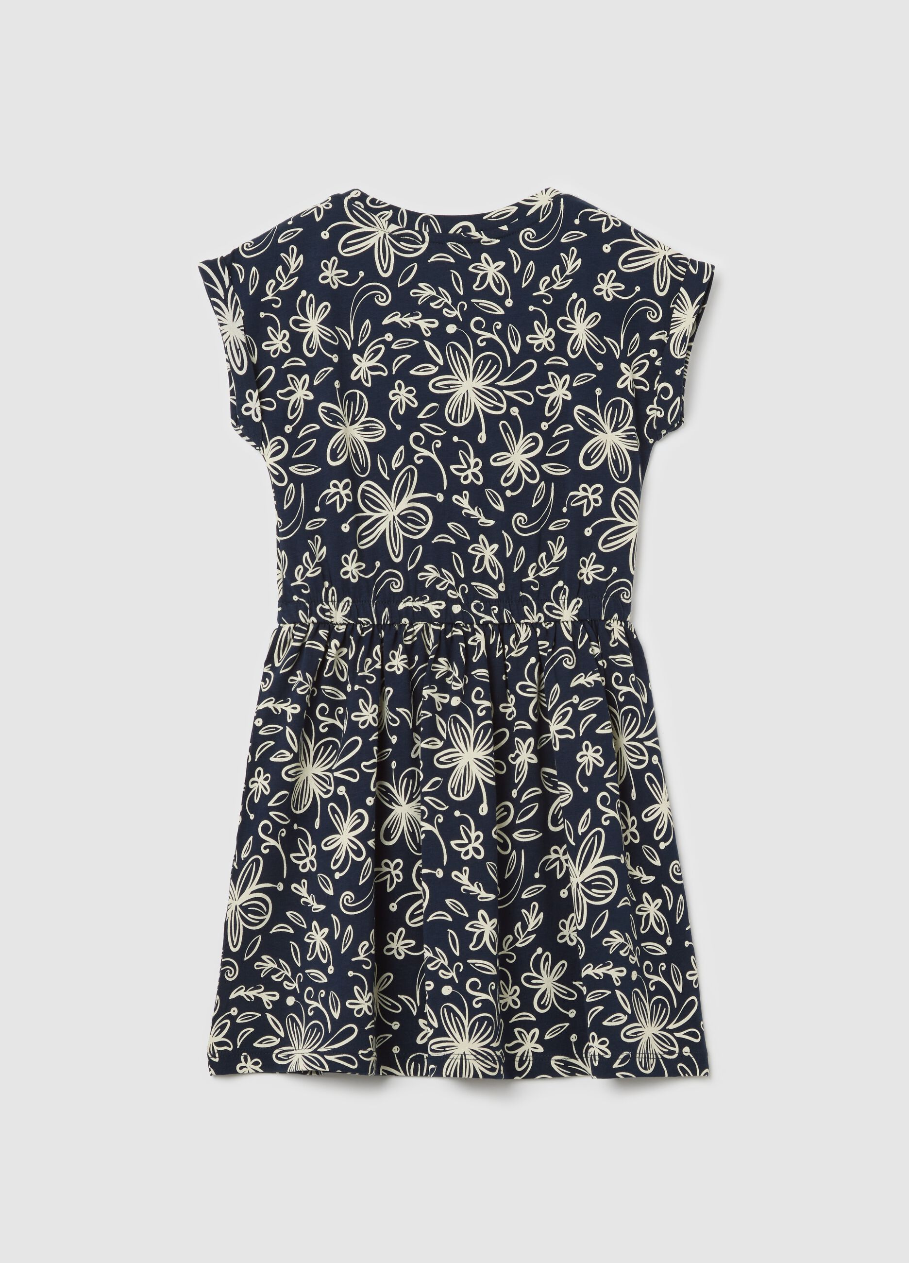 Blue sleeveless dress with floral motifs