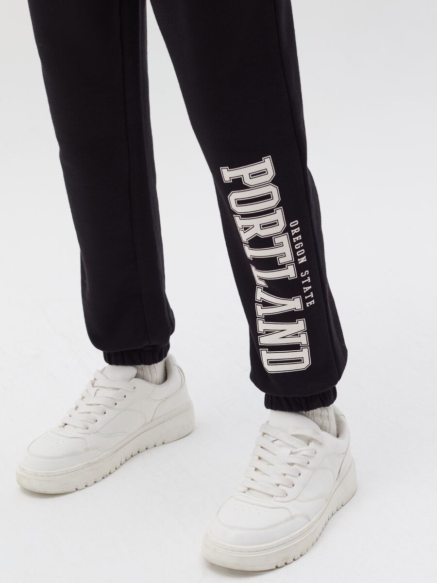 Joggers with elasticated edging and lettering print_1