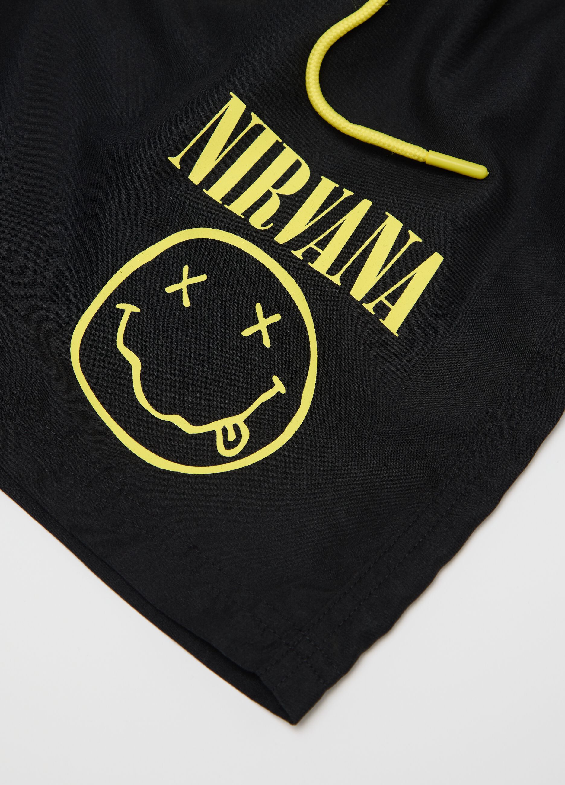Black swimming trunks with Nirvana logo