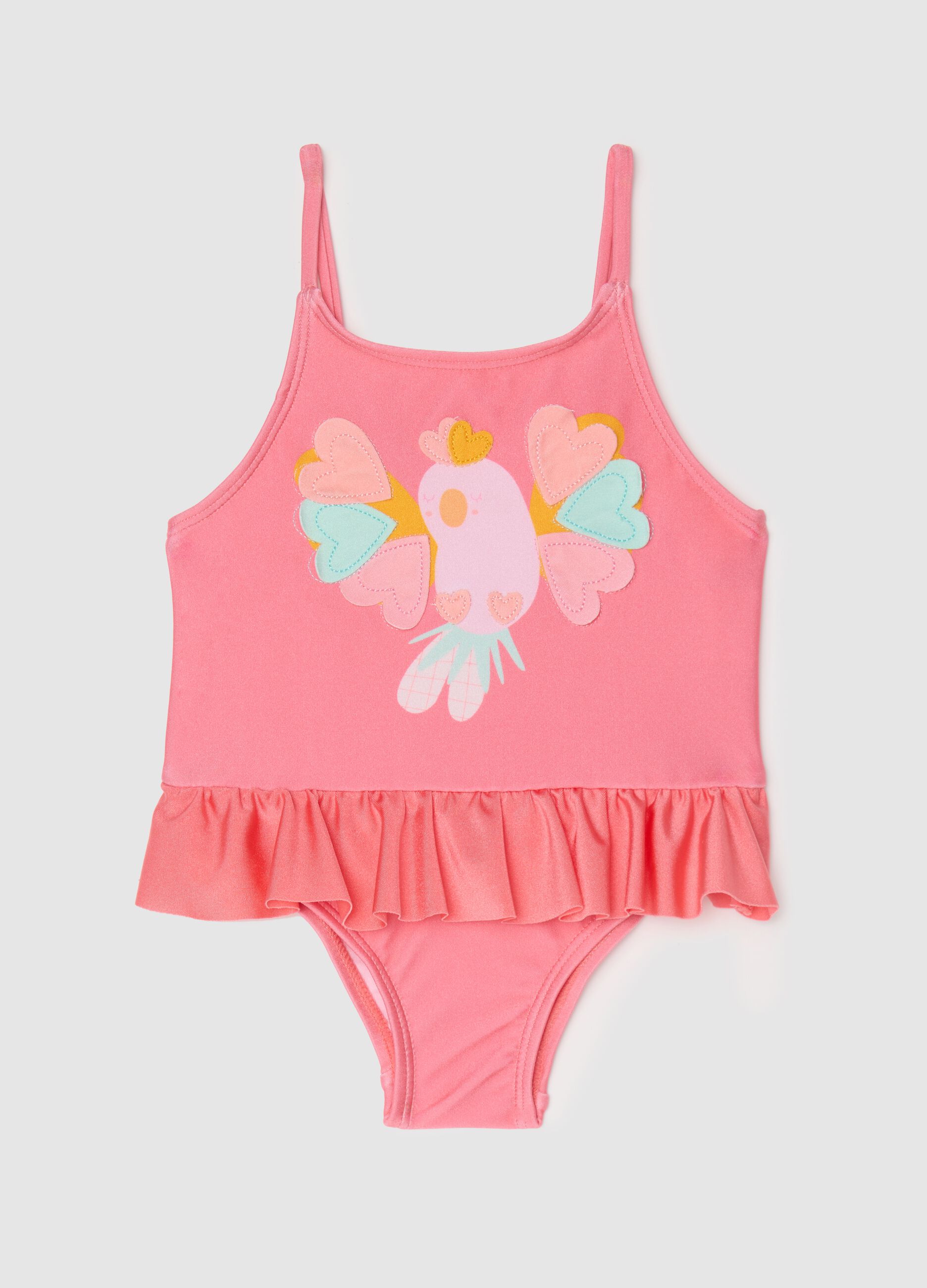 One-piece girls’ costume in stretch pink fabric