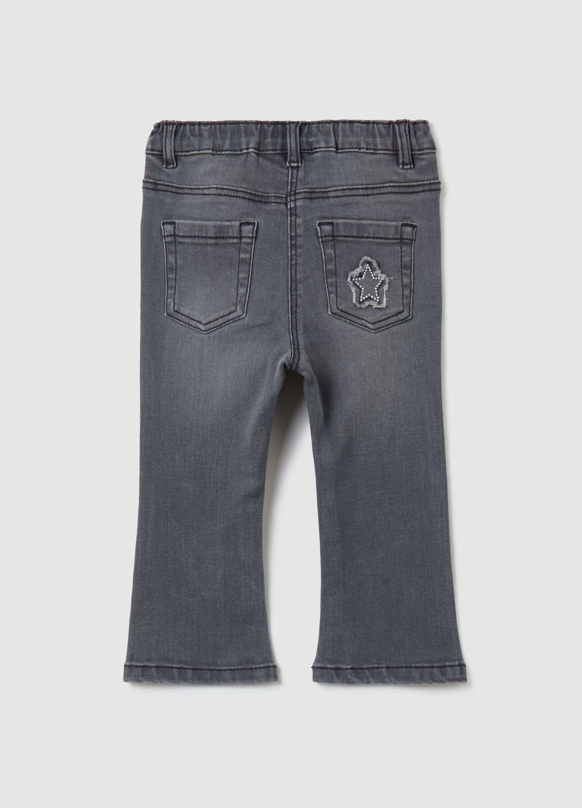 Flare-fit jeans with five pockets with diamantés