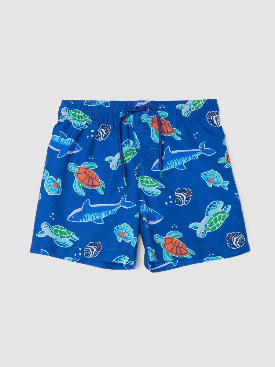 Blue boys&rsquo; swim shorts with ocean print_0