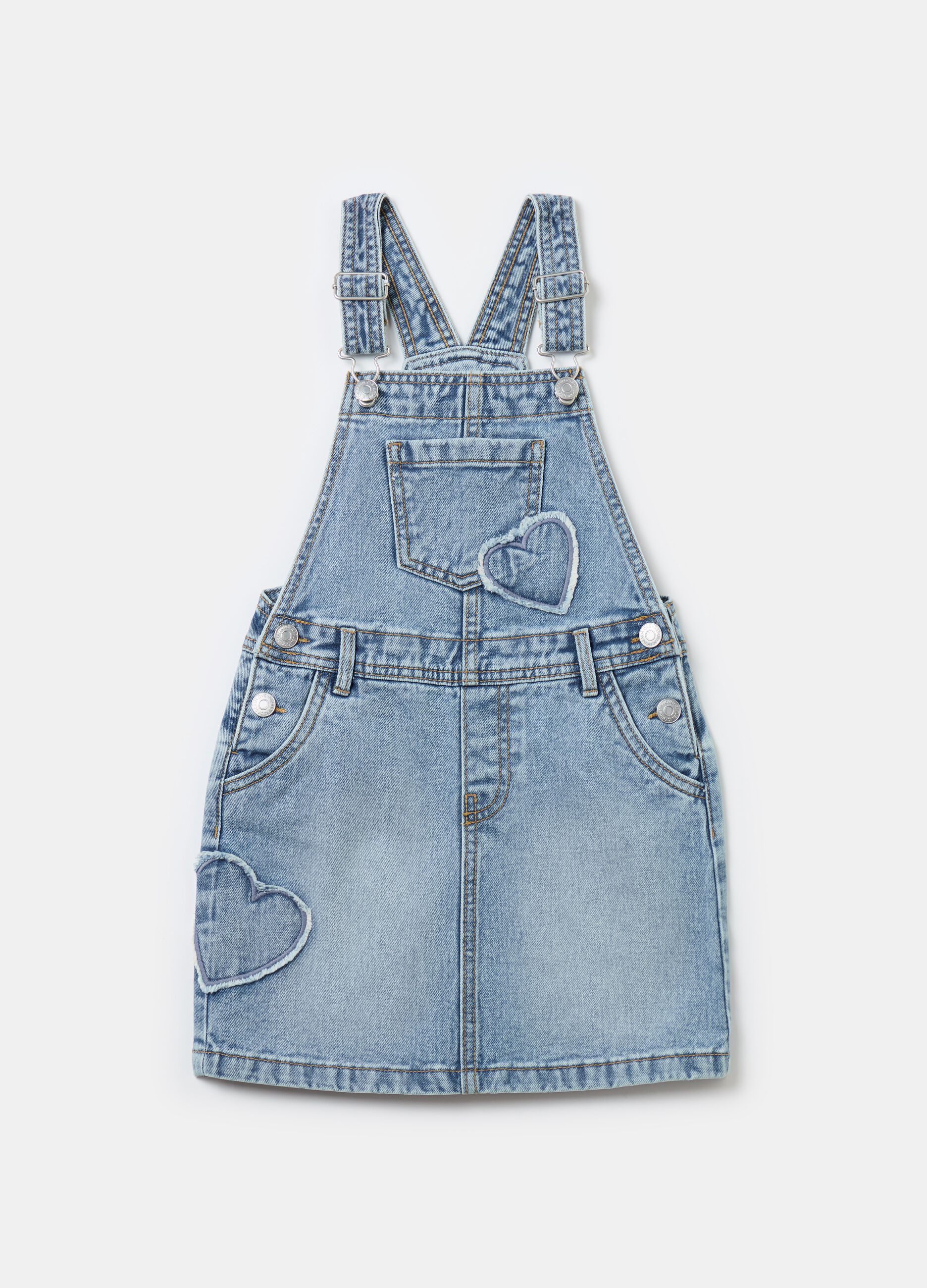 Pinafore in denim with heart embroidery