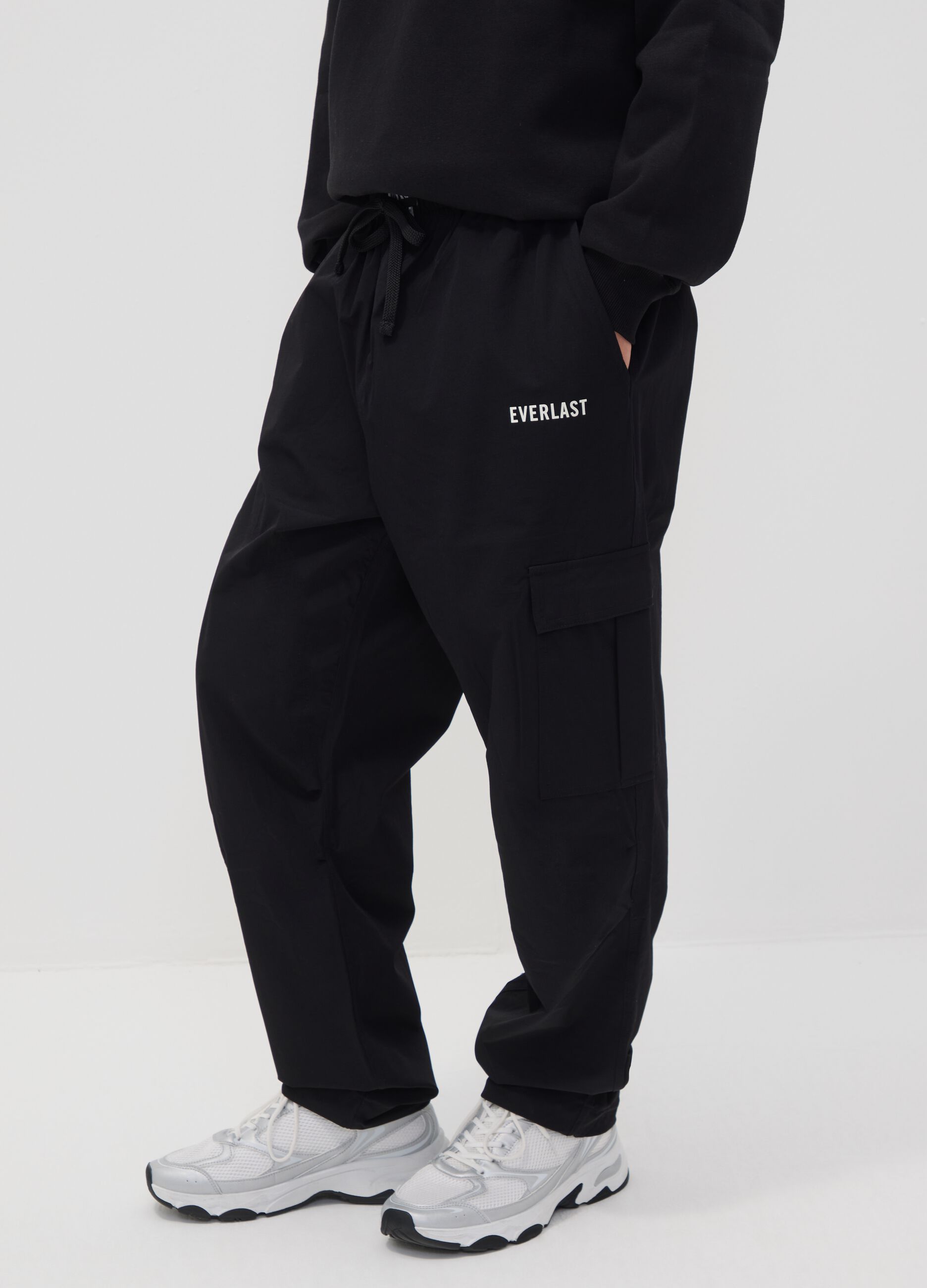 Black sporty cargo trousers with drawstring