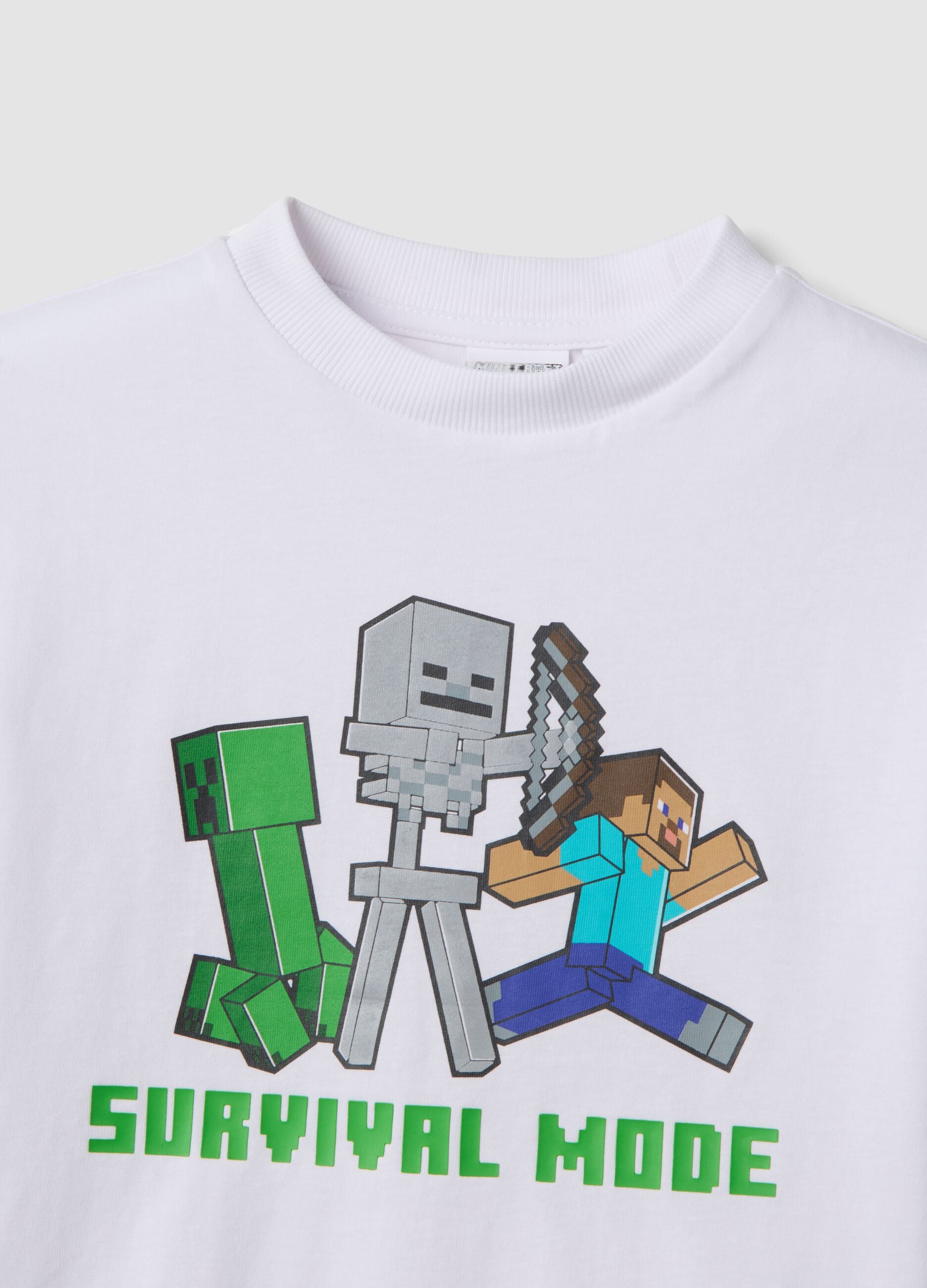 Completo bianco e verde in puro cotone con t-shirt e shorts per bambino over fit