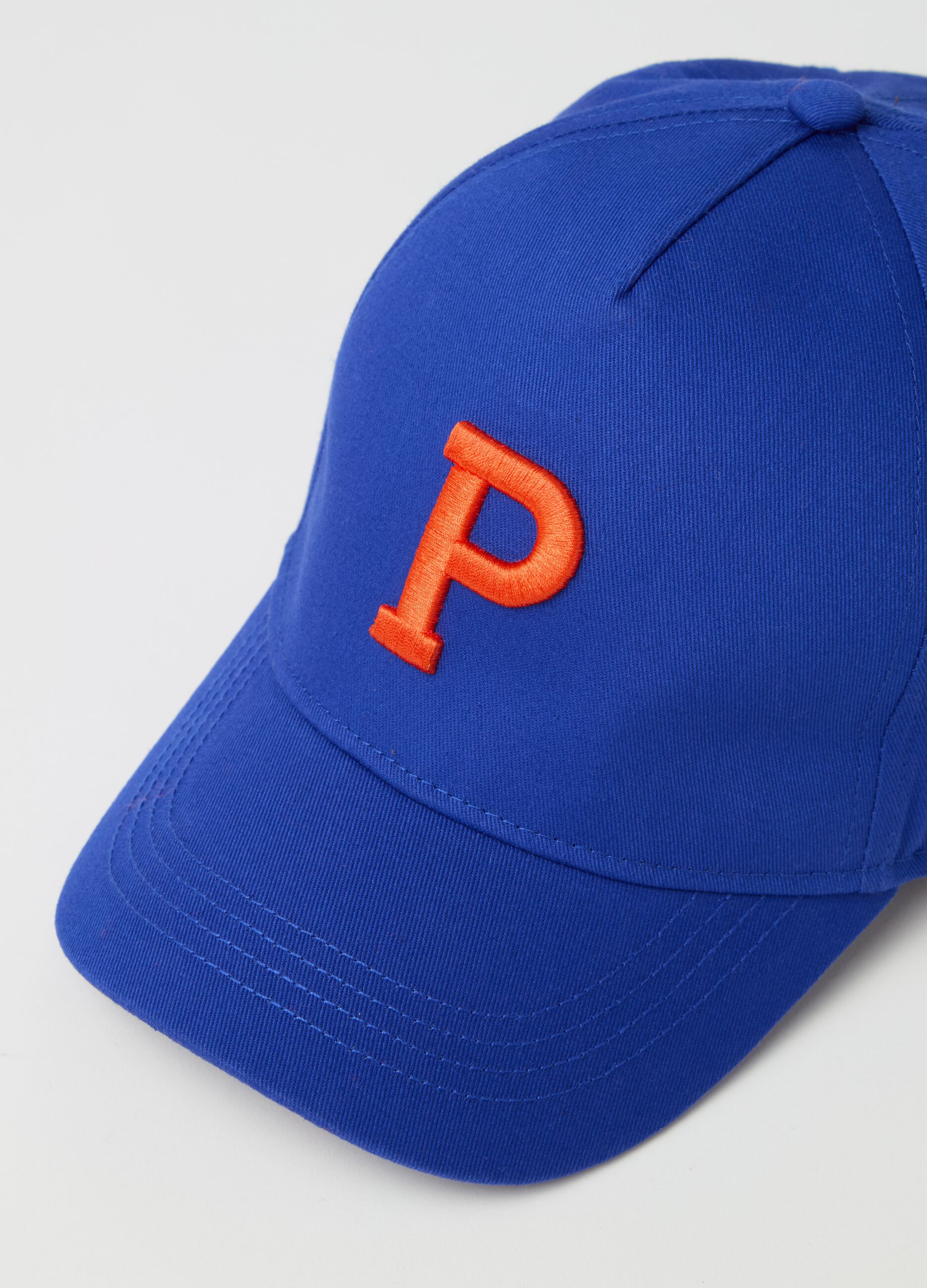 Baseball cap with embroidered logo