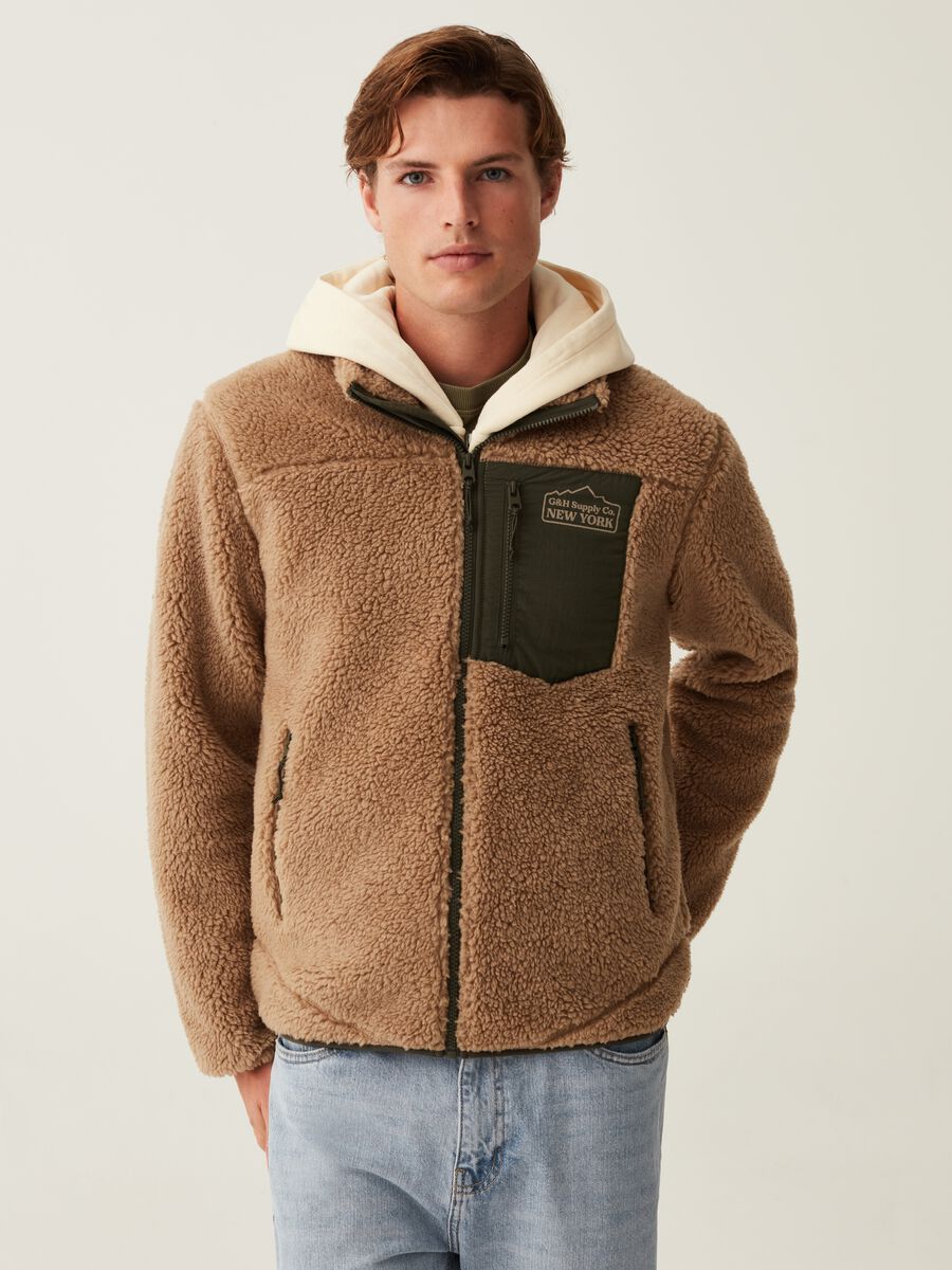 Full-zip in sherpa con tasche_1
