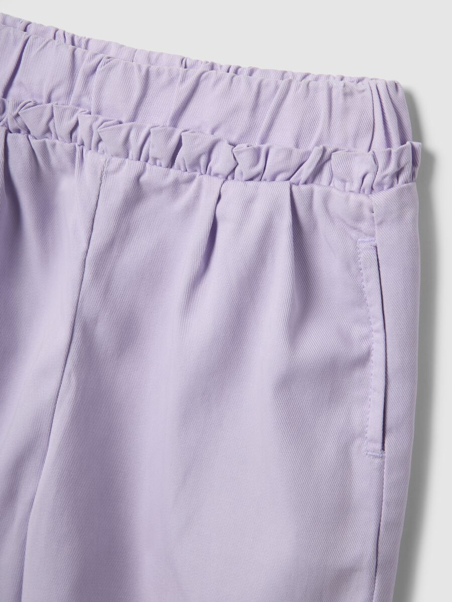Purple lyocell and cotton baggy trousers for girls_2
