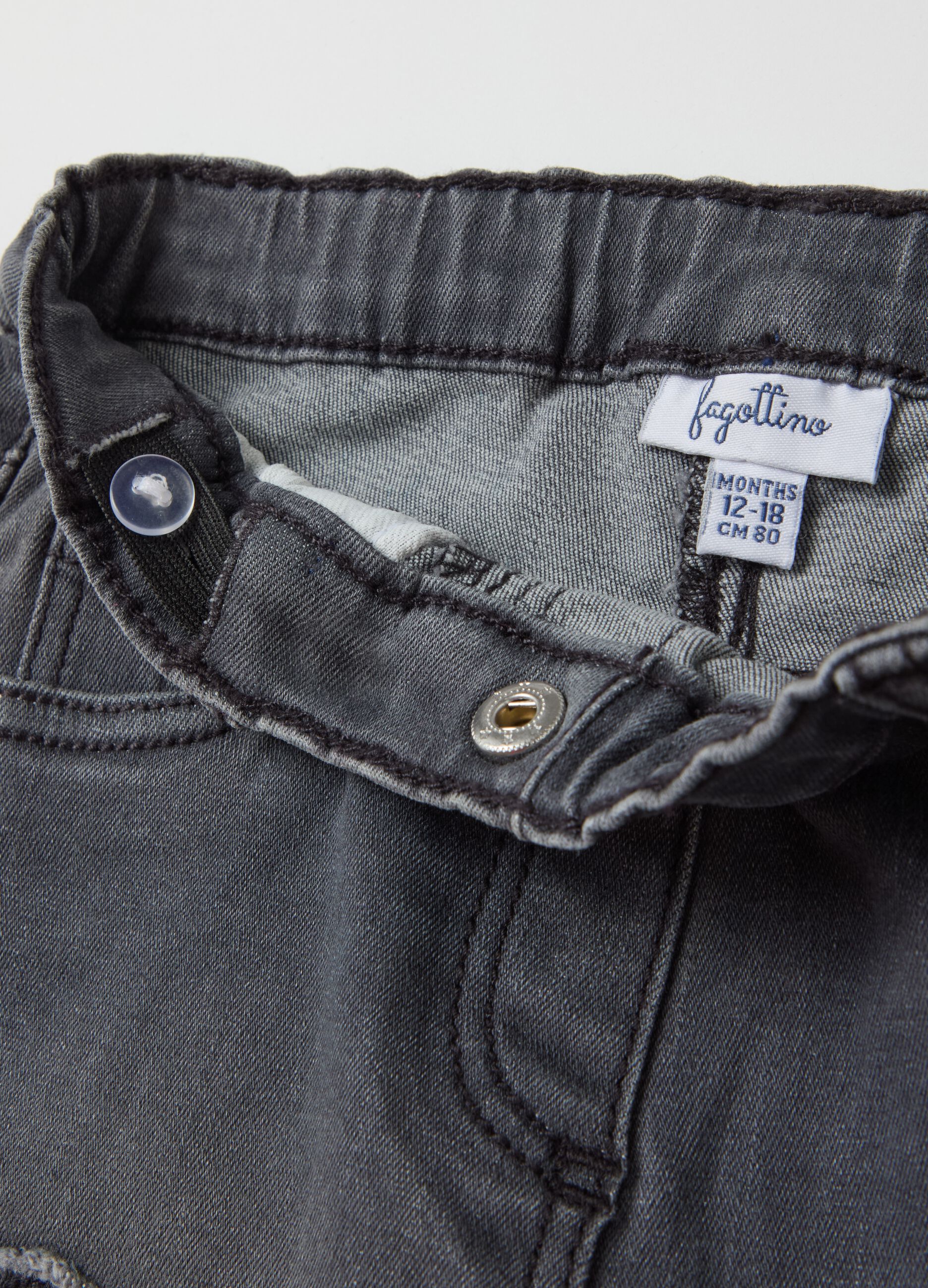 Flare-fit jeans with five pockets with diamantés