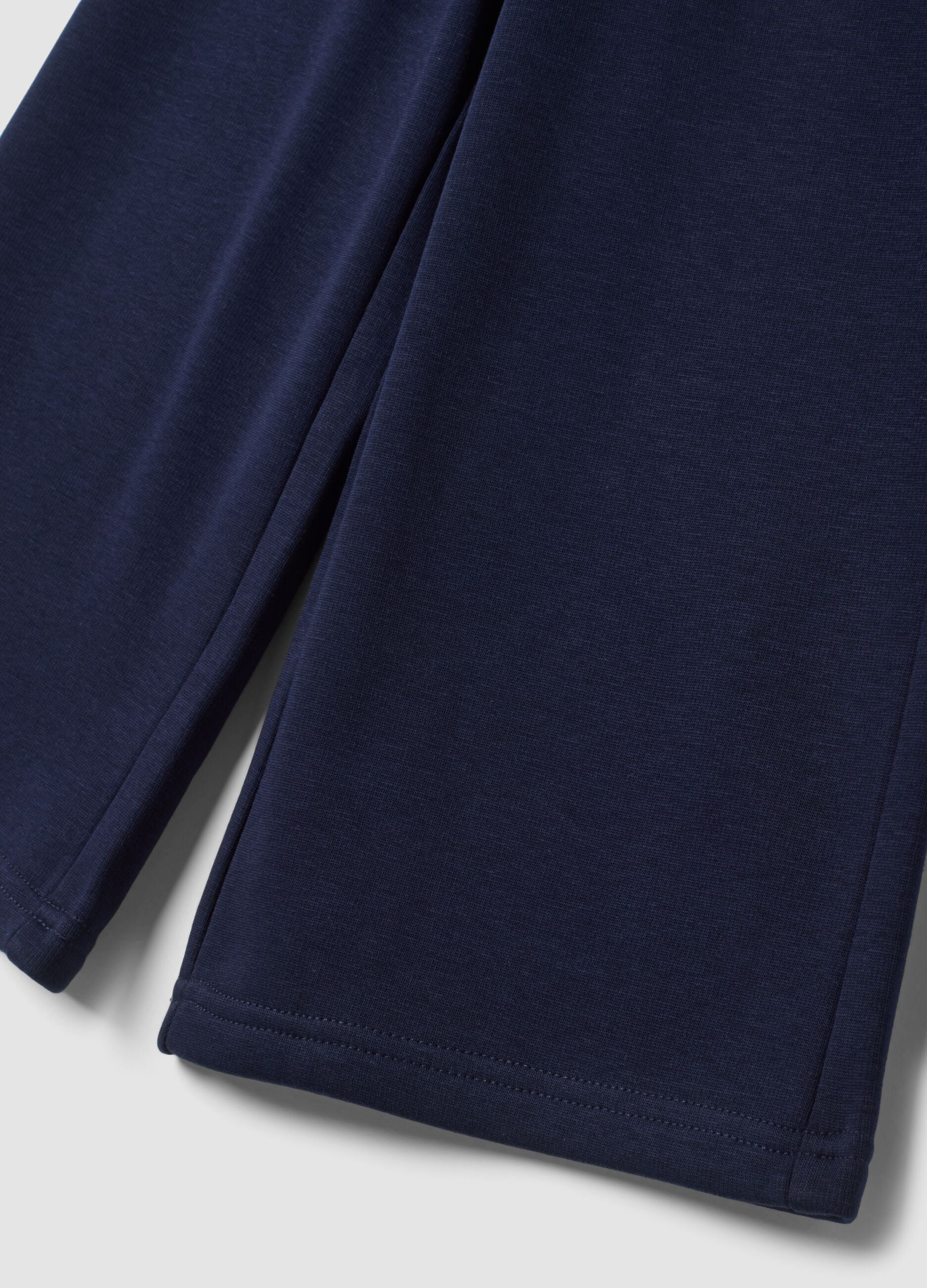 Pantaloni blu wide leg in tessuto fleece elasticizzato