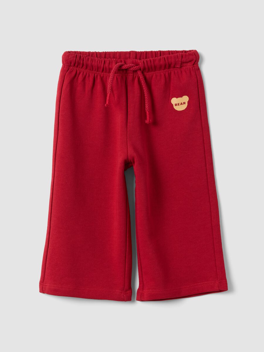 Red pure cotton trousers with elasticated waist and print for baby girls_0