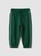Pantaloni jogger verdi in puro cotone organico con coulisse per bimbo_0