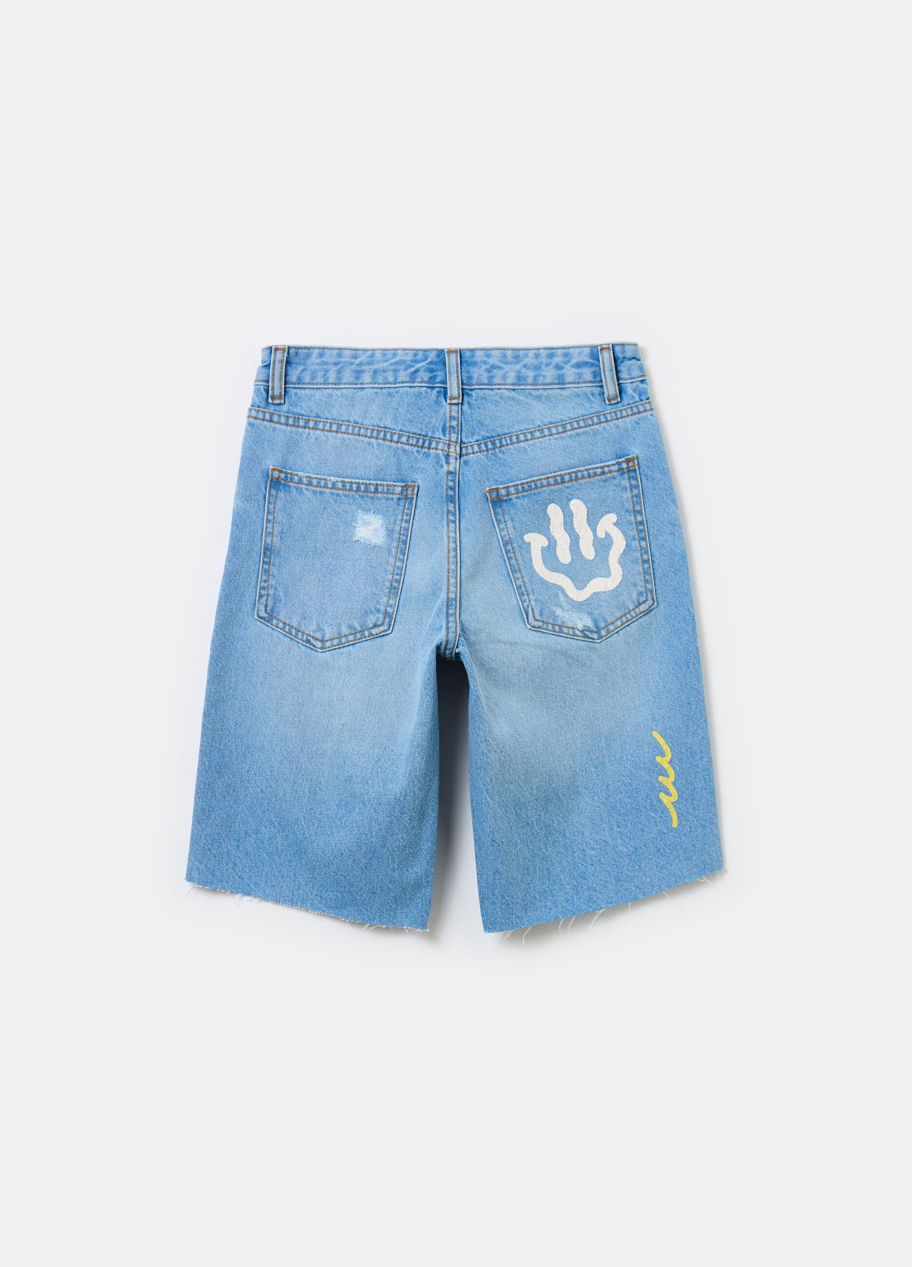 Denim Bermuda shorts with abrasions and print